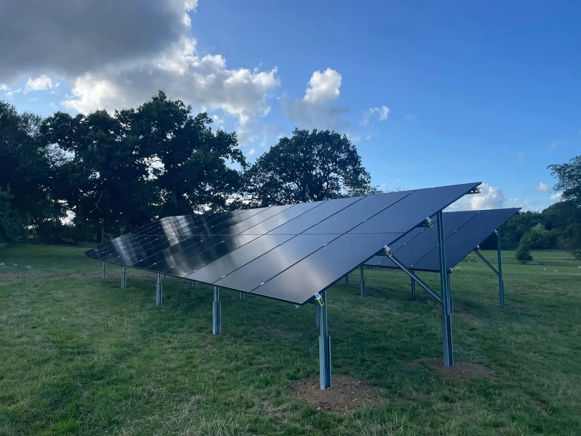 Ground-mounted solar panel array installed at a rural property in Beckwithshaw, designed to generate renewable energy and reduce reliance on grid electricity.