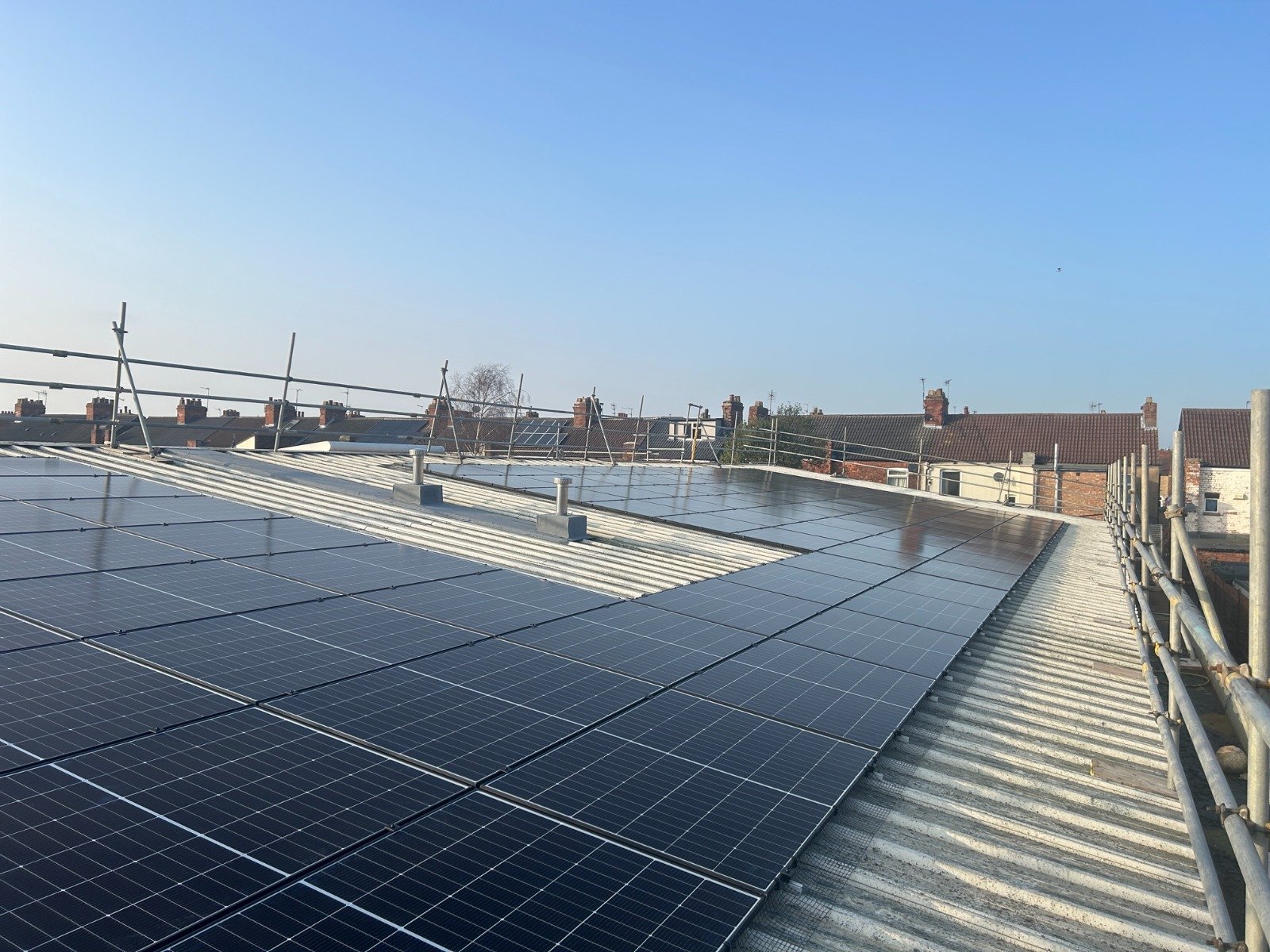 Solar panels installed on a commercial rooftop by P4 Solar in West Yorkshire.