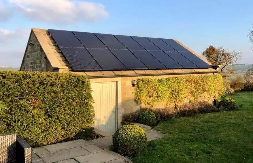 A residential property with sleek black solar panels provided and installed by P4 solar, Yorkshire.