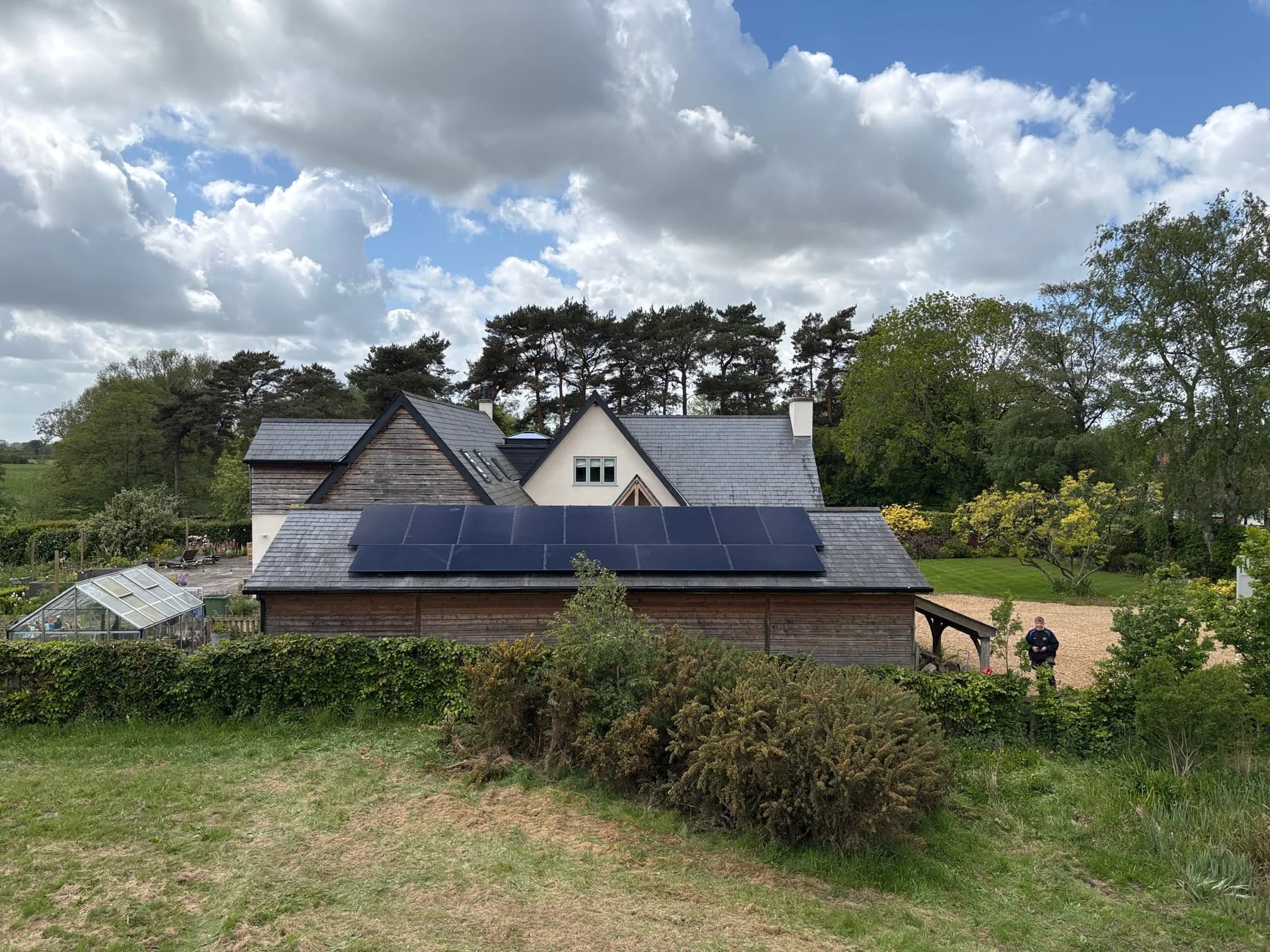 Residential rooftop installation - view of house roof with solar panels