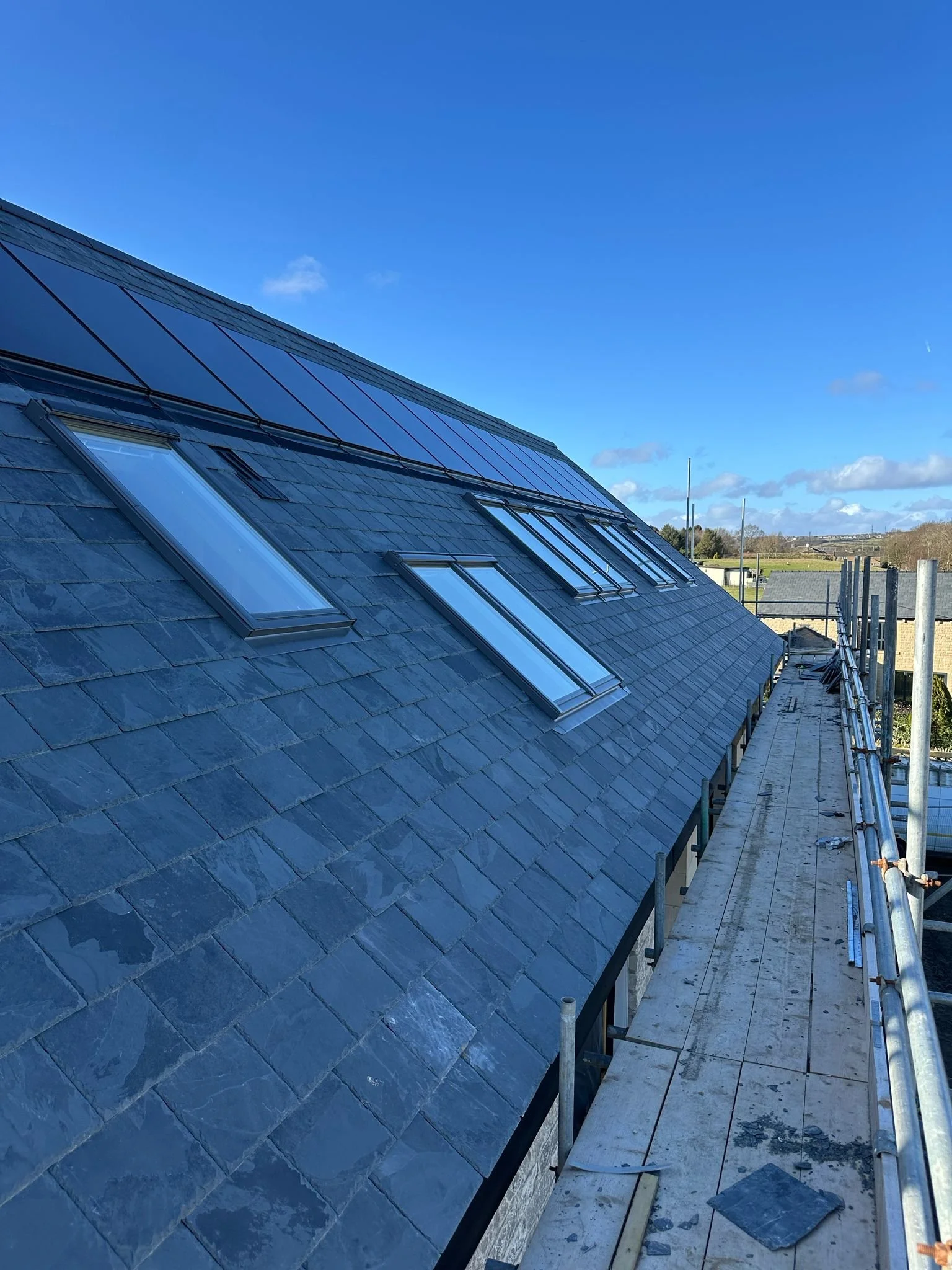 In-roof solar panels with scaffolding