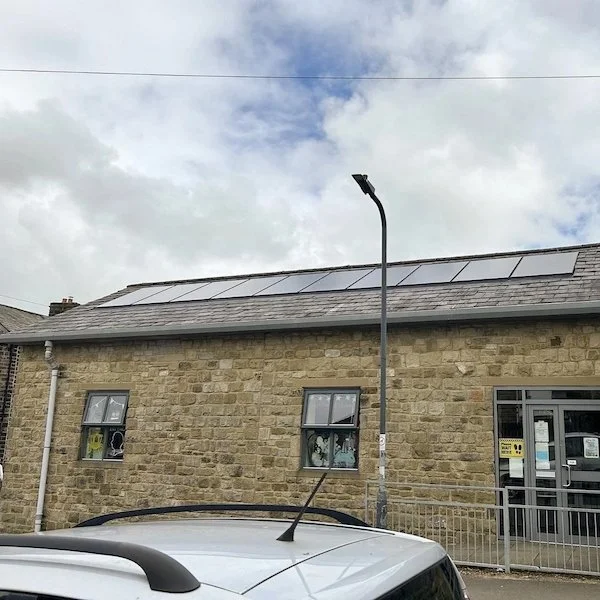 Solar panels installed on the roof of Cowling Village Hall, community solar installation, Keighley area