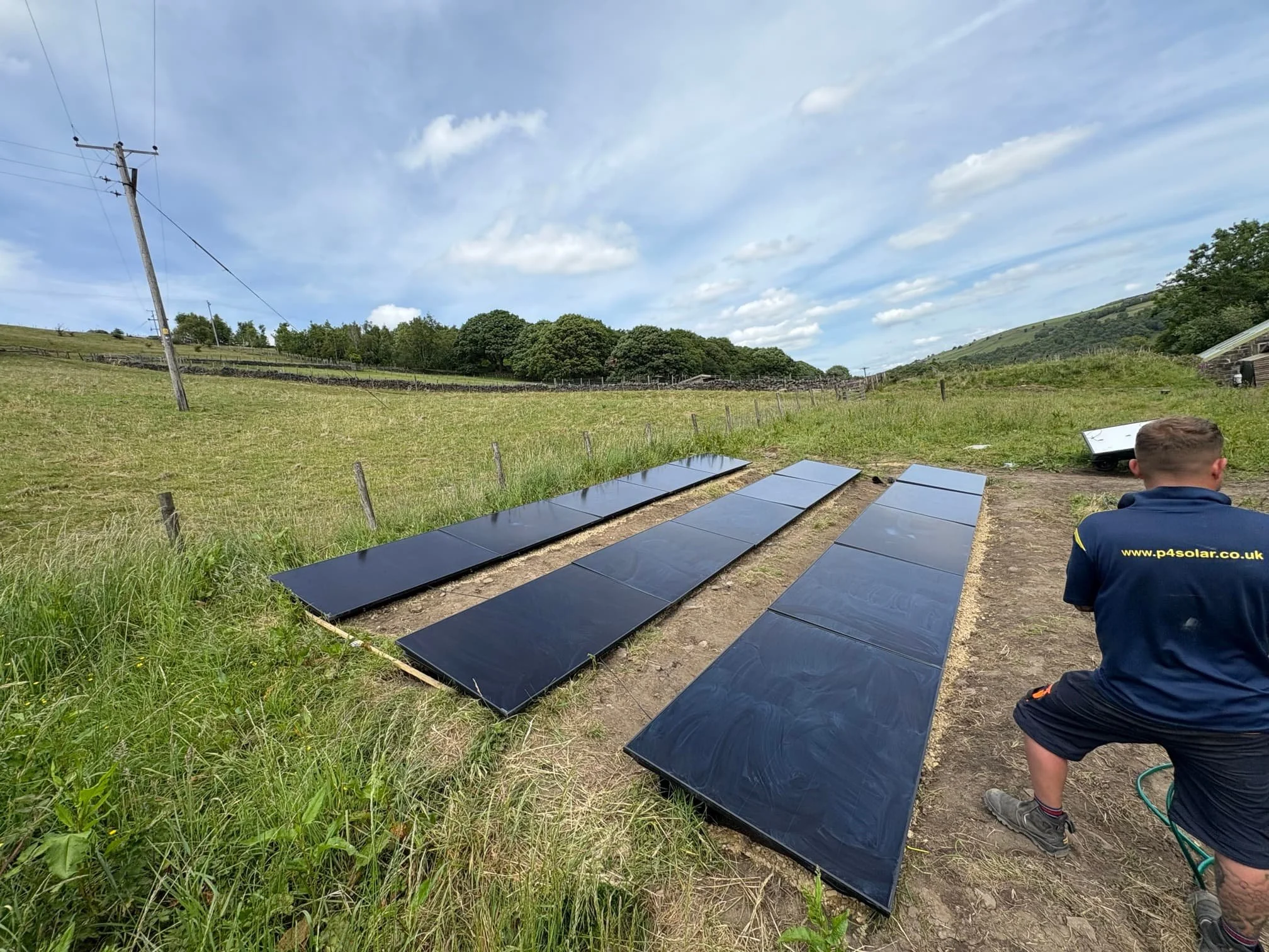Ground mounted solar panel installation generating renewable energy on rural land
