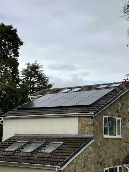 Aerial view of solar panels installed across a roof, Ilkley