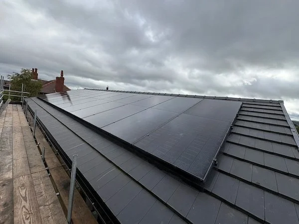 Aerial view of solar panels installed on a slate roof, Wakefield