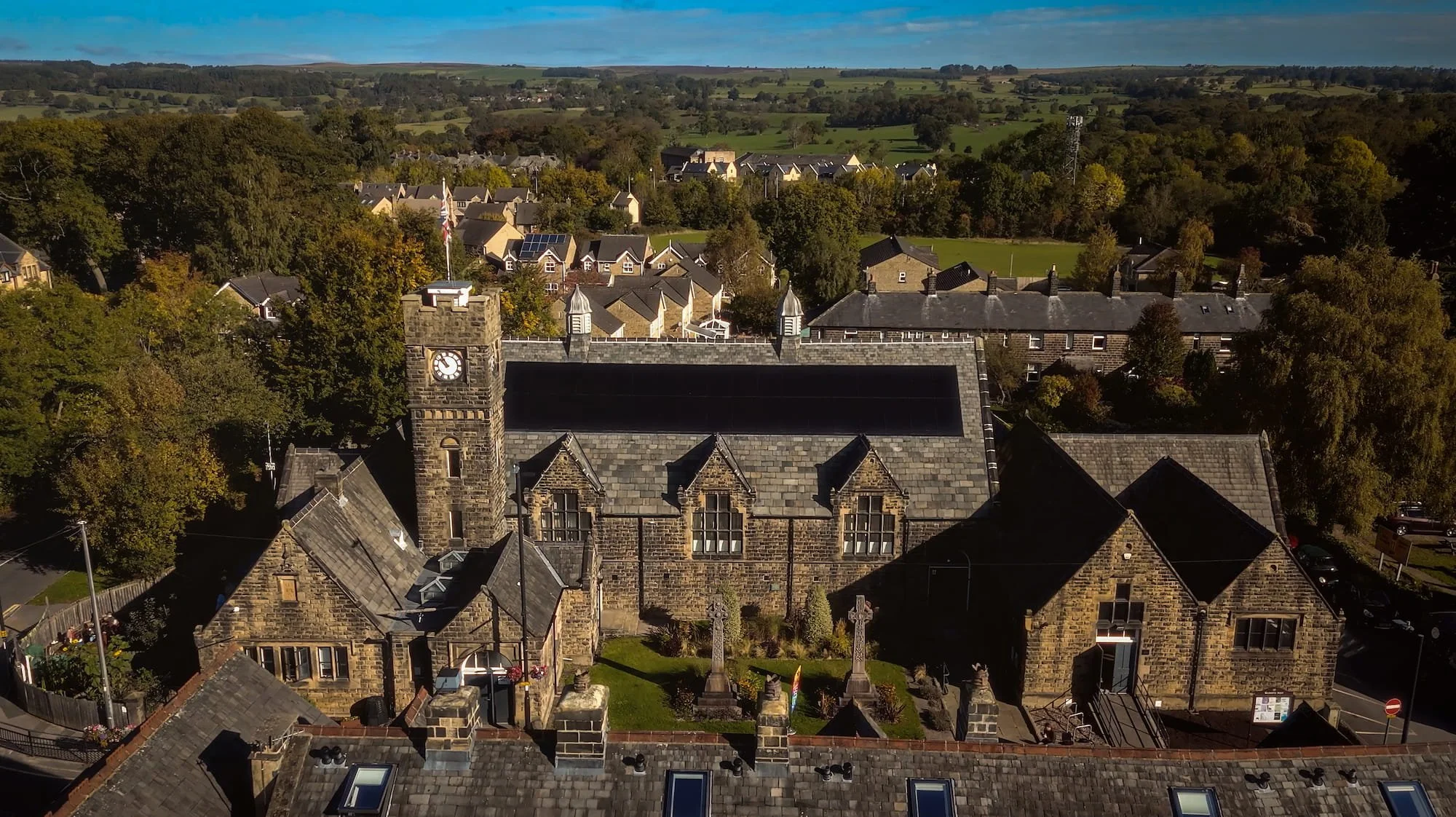 Community building benefiting from renewable energy through solar panel installation