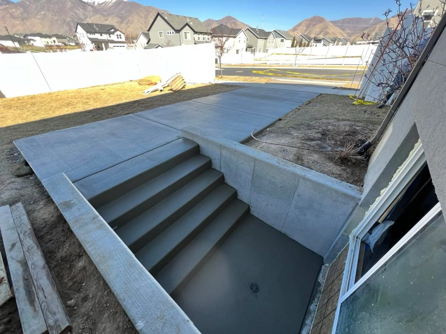 . WALKOUT W/ WALKWAY 
. ☎️Call or Text for your Free quote today☎️
.  801.859.6248
.  KALKO Concrete &amp; Construction 
.
Sport Court, Retaining Wall, Patio, Driveway, Footing &amp; Foundation, Walkout Basement, Decorative Concrete, walkway,Shed Pad