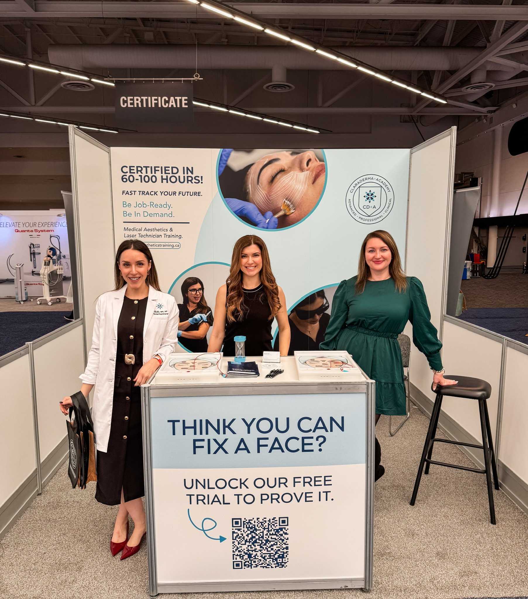 Photo of women at a medical aesthetic conference booth