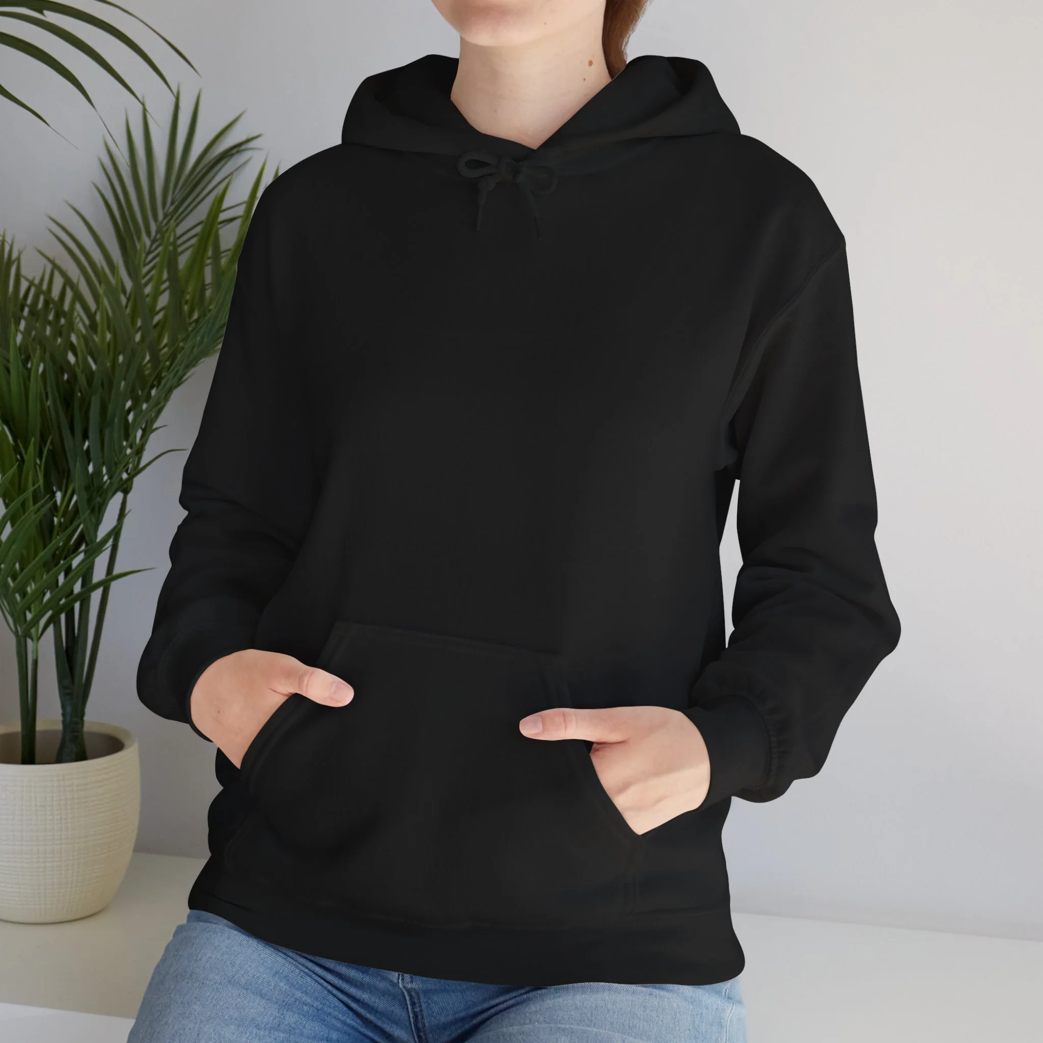 Front view of black hoodie with kangaroo pocket from Australian wildlife inspired apparel collection.