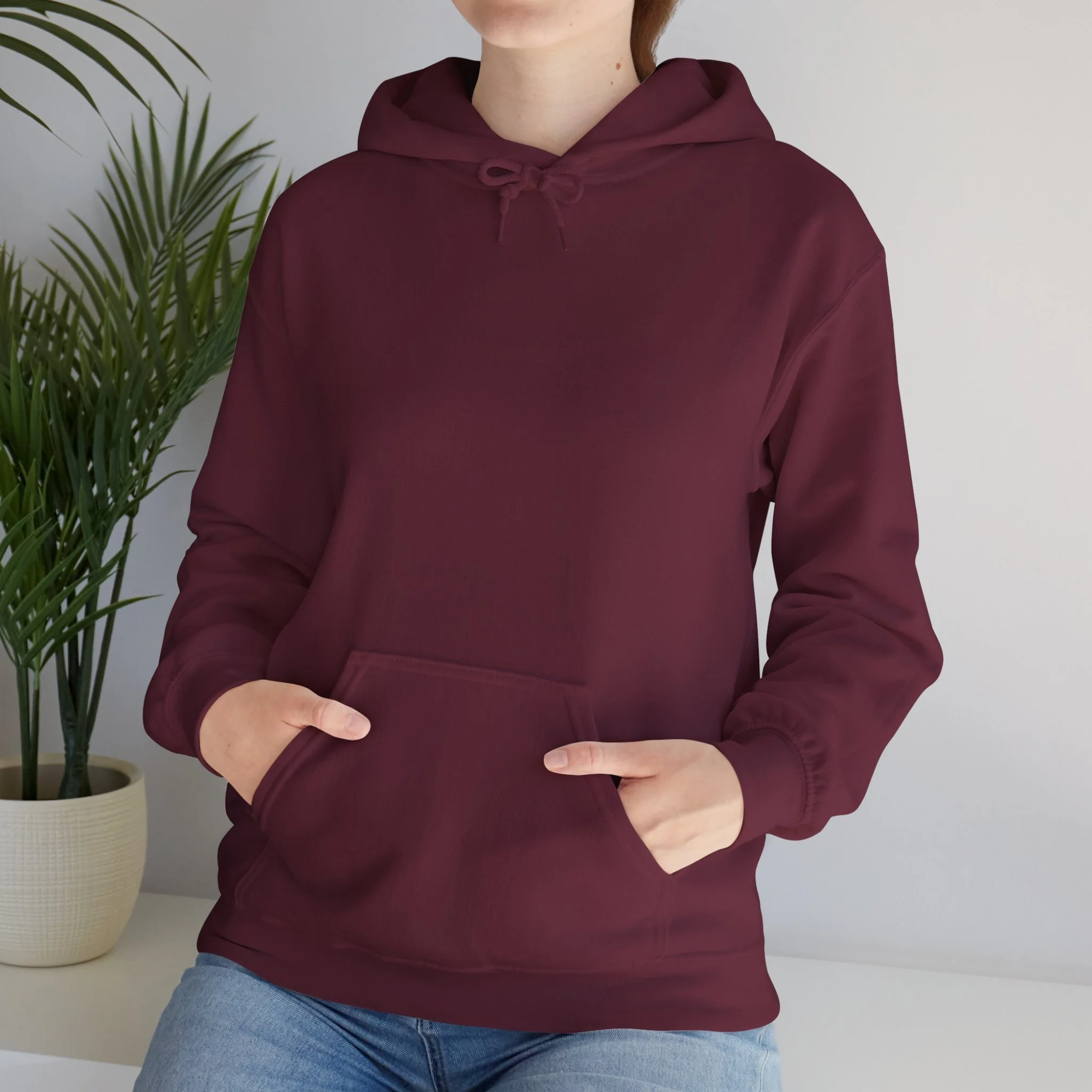 Front view of maroon hoodie with kangaroo pocket from Western Australia nature inspired clothing collection.