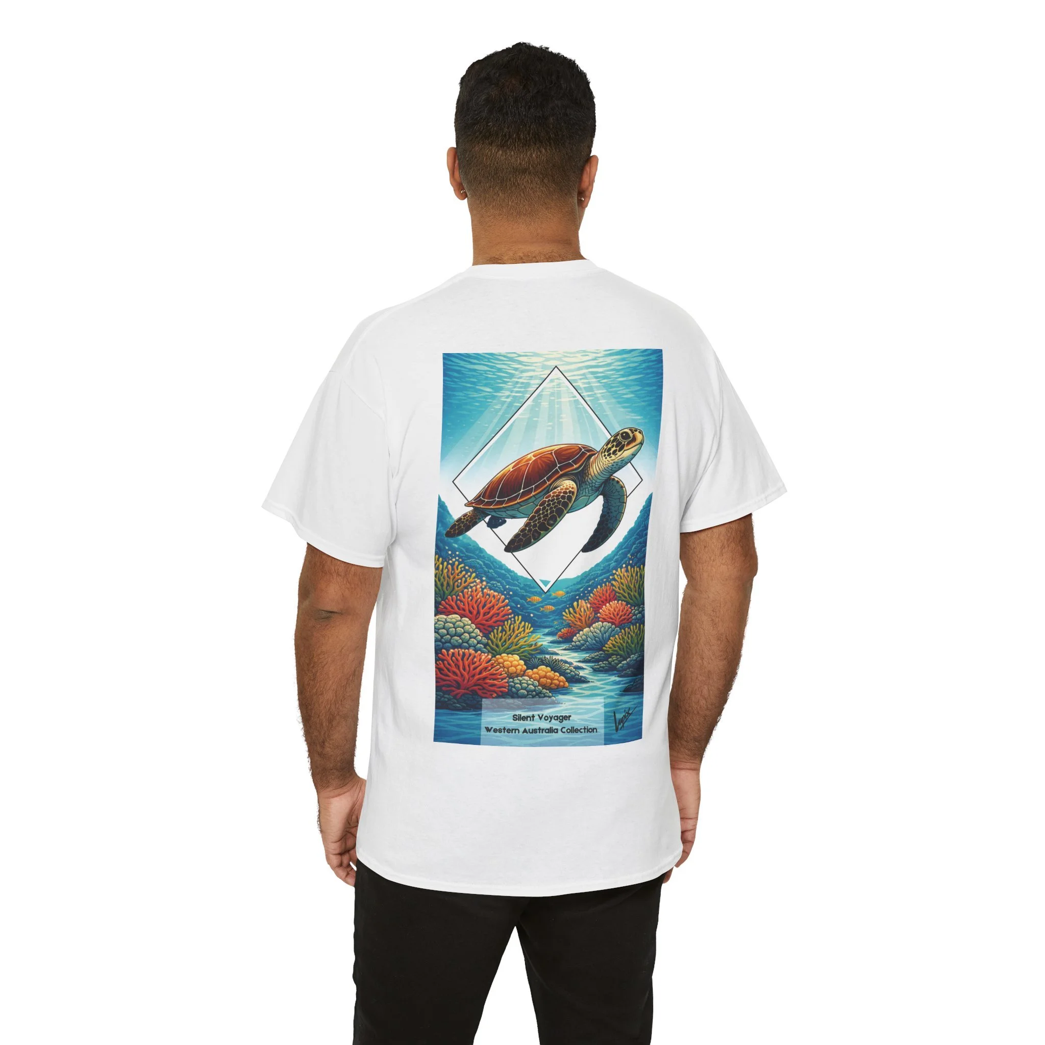 White t-shirt featuring sea turtle swimming over coral reef inspired by Australian ocean wildlife.