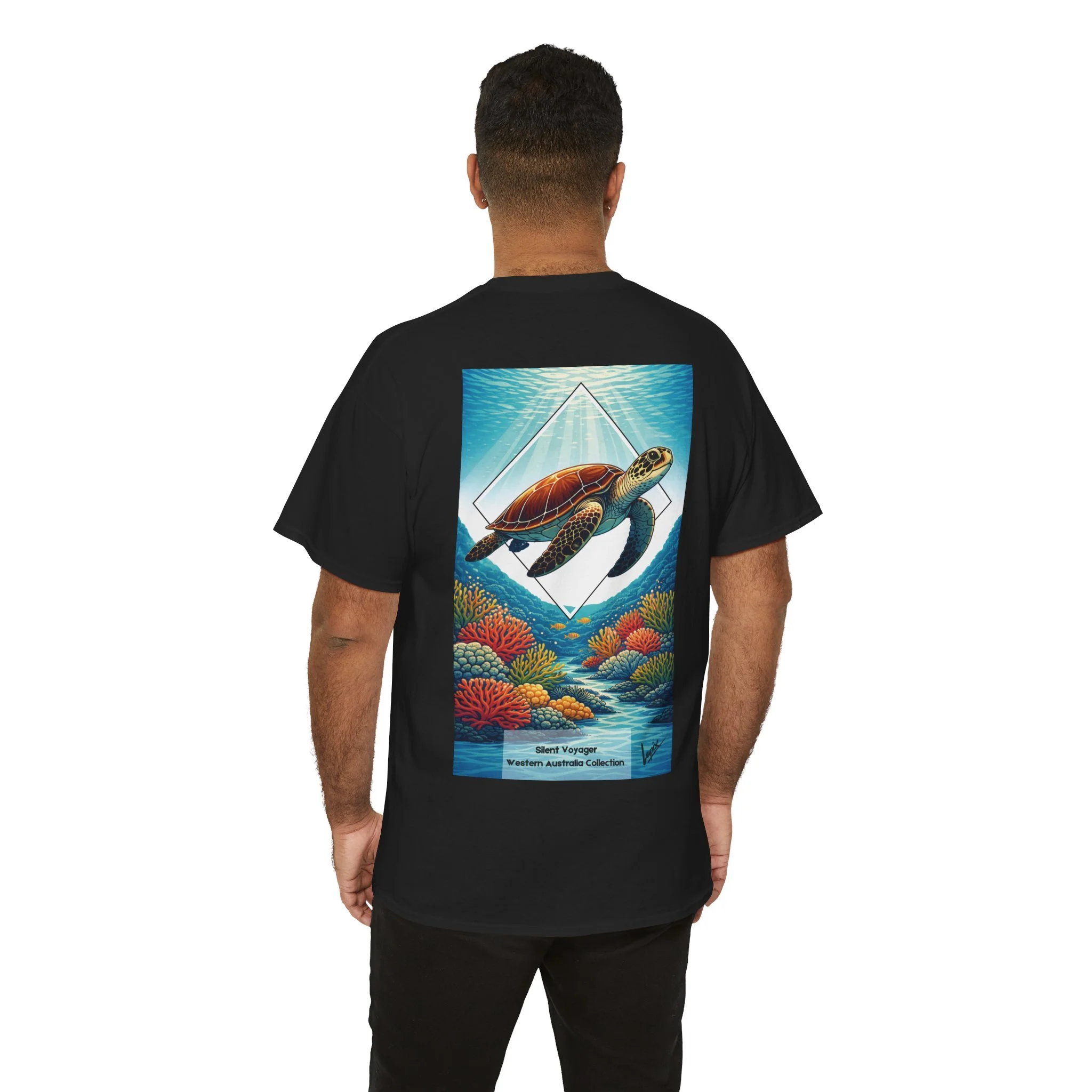 Black t-shirt featuring sea turtle swimming over coral reef inspired by Australian ocean wildlife.