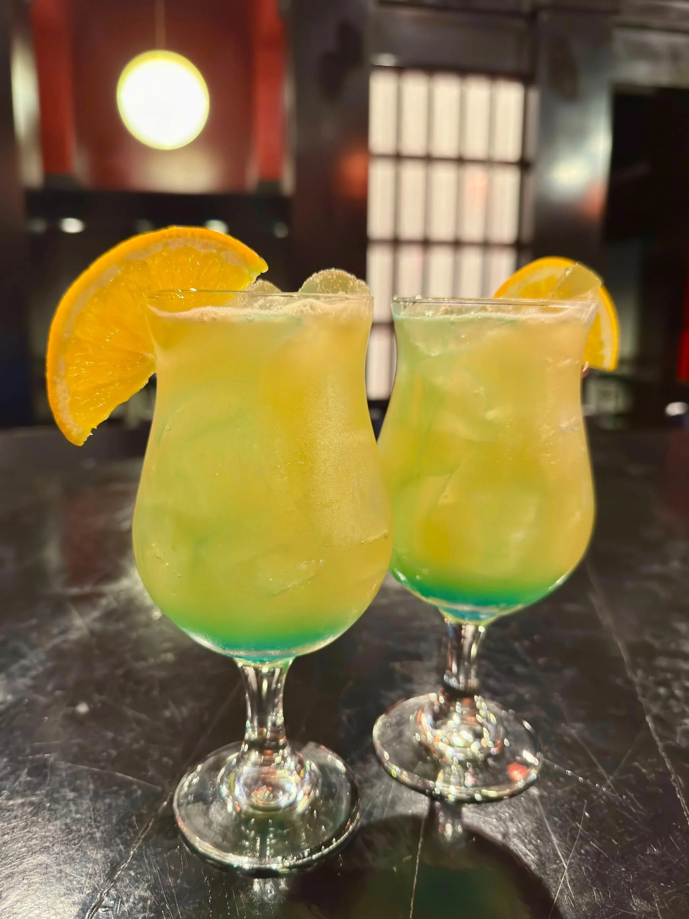 tokyo-japanese-steakhouse-mcdonough-hibachi-restaurant-sushi-restaurant-bar-best-hibachi-mcdonough-pirate-punch-captain-morgan-rum-coconut-rum-pineapple-juice-blue-curacao-rum-cocktail-best-hibachi-mcdonough.jpg