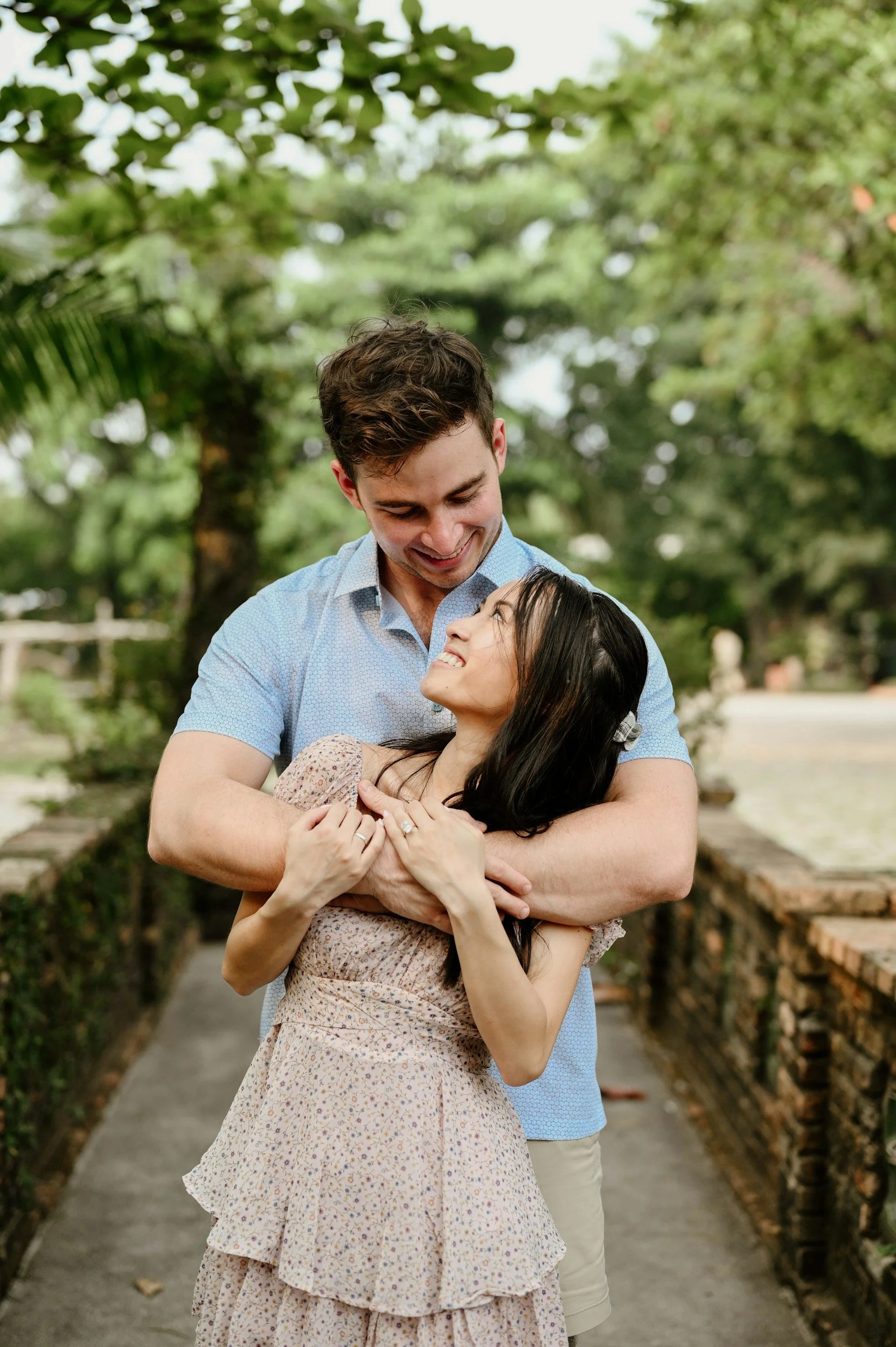 man holding a woman in supportive embrace