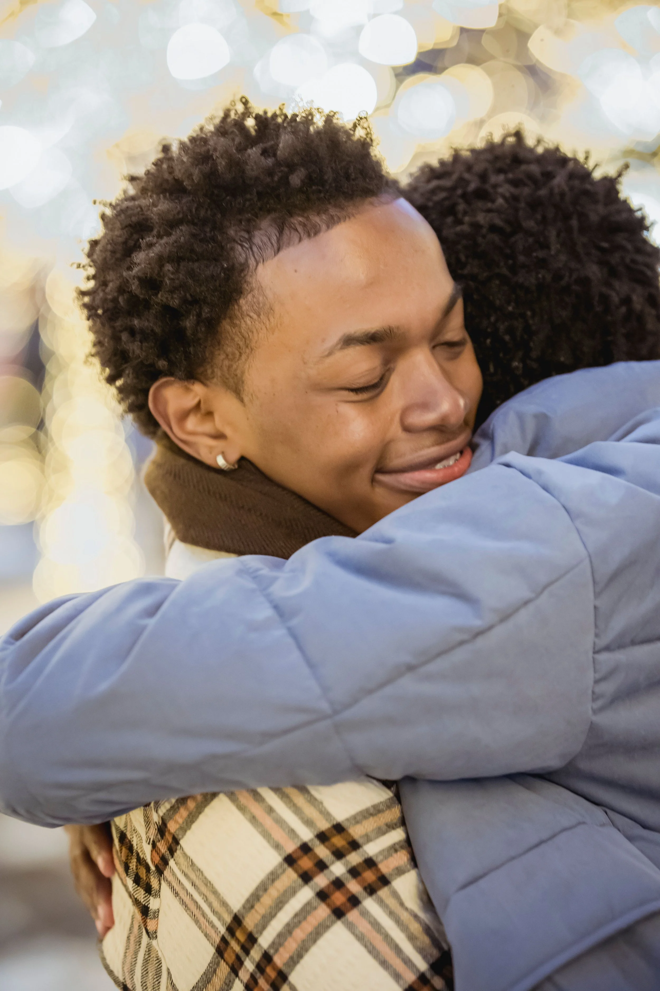 two people hugging for emotional support