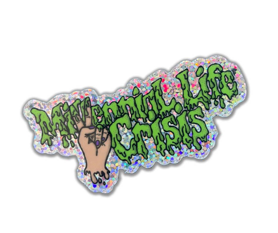 A sticker with a glittery background featuring a hand holding up the peace sign and dripping green text that says 'Millennial Life Crisis'.