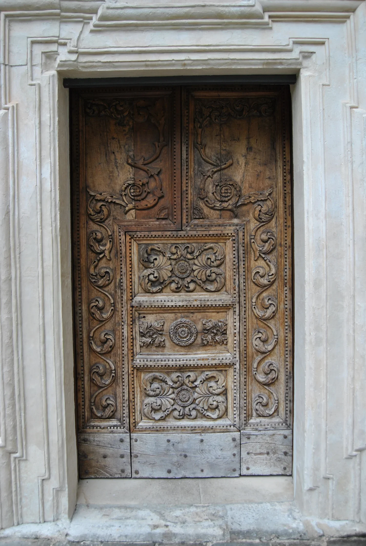 intricately carved european doorway