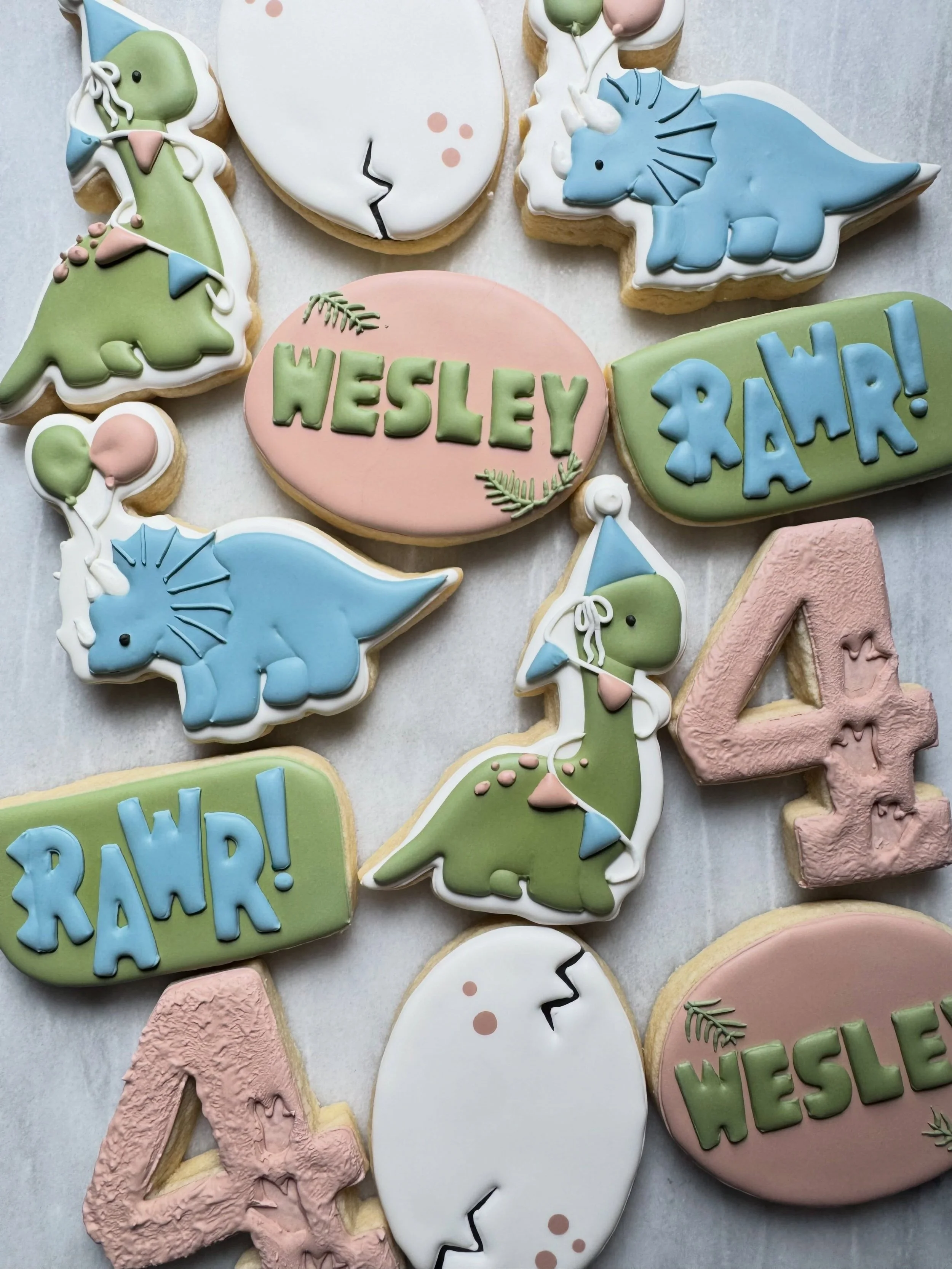 Roar into four!! 🦕 
&bull;
&bull;
&bull;
#IcedByAnna
#CustomSugarCookies
#BirthdayCookies
#DinosaurCookies
#RoyalIcingCookies