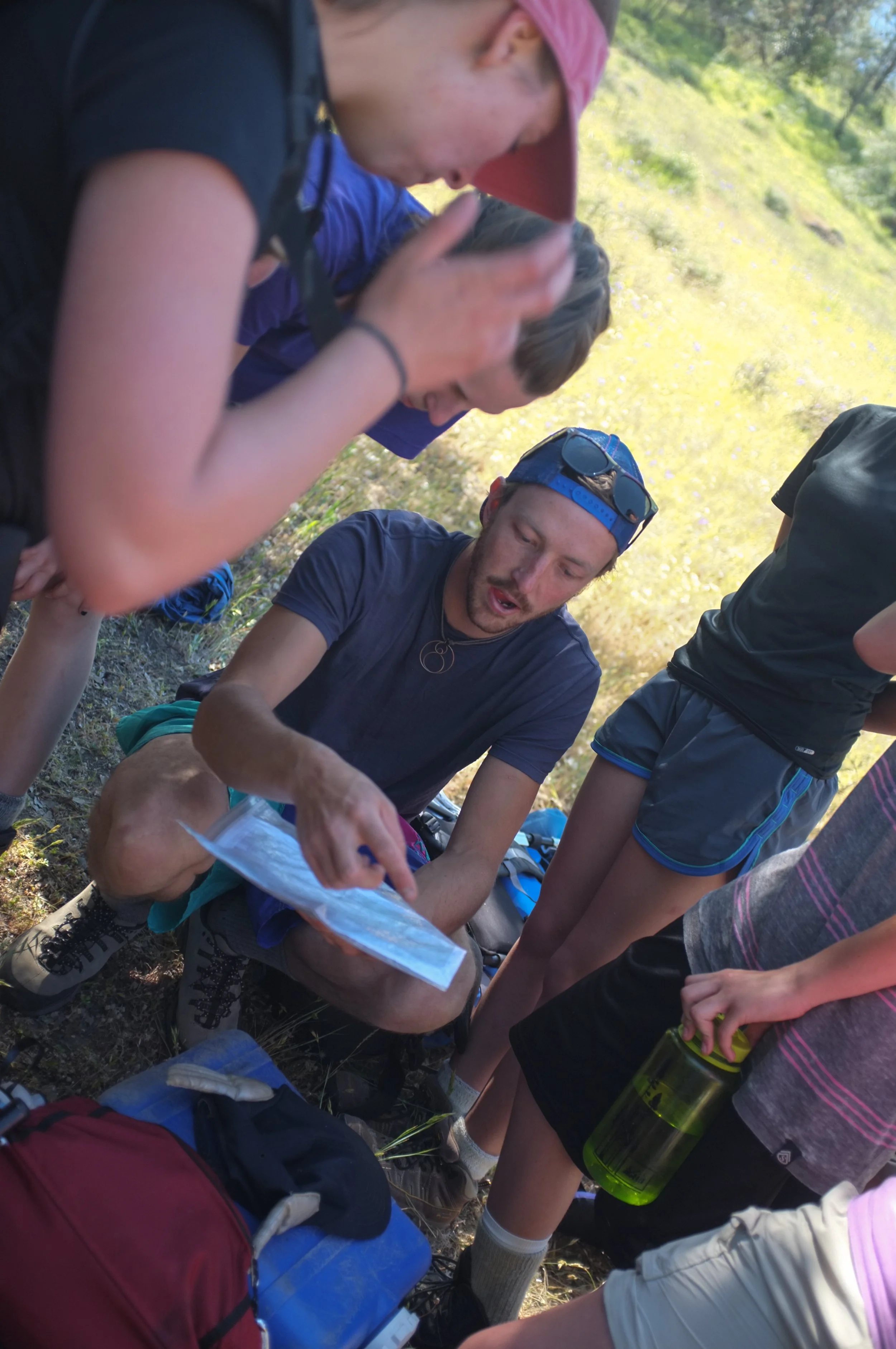 Geometric drawing of an outline square with sections divided by vertical, horizontal, and circle lines.