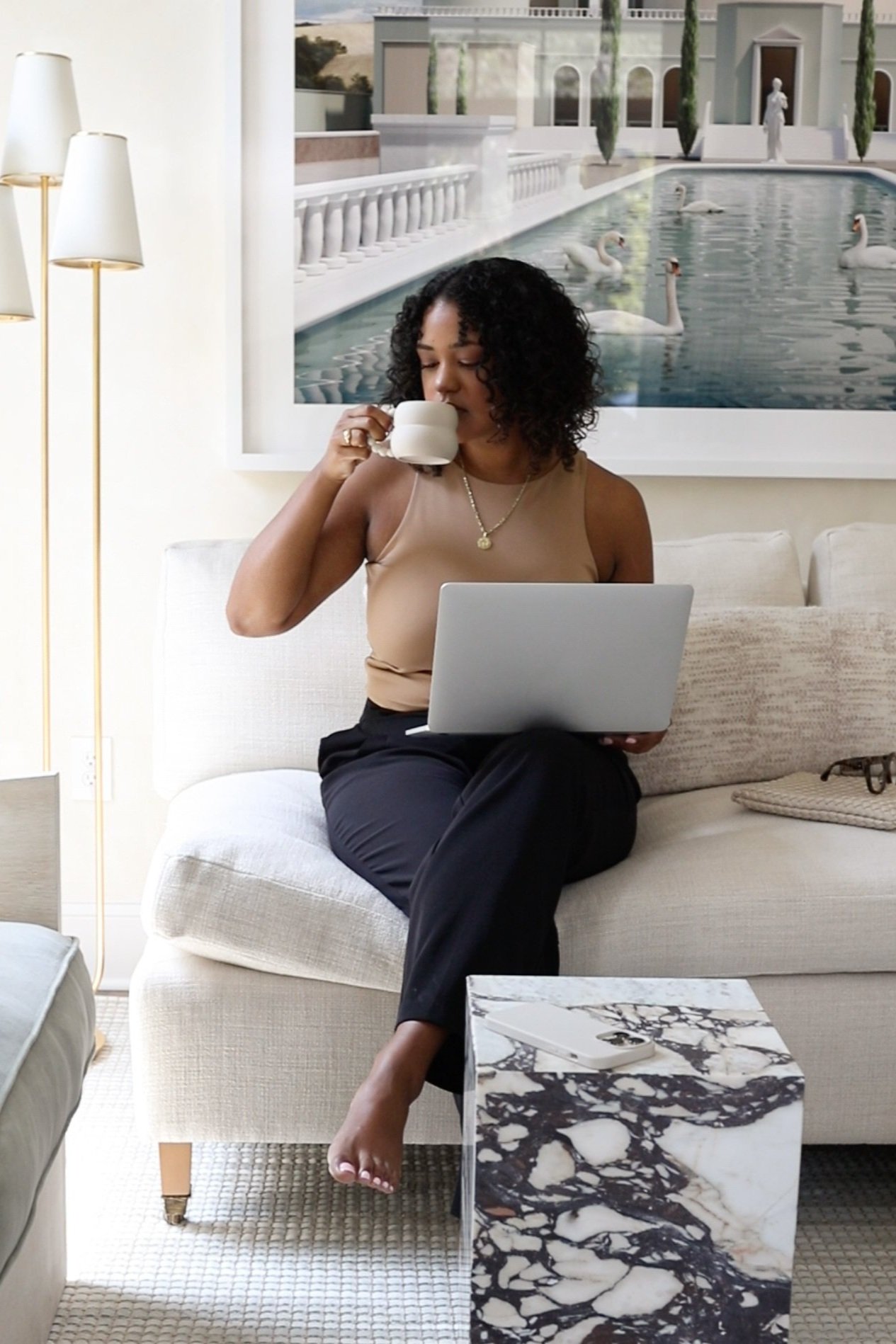 Wedding planner working on her SEO while sipping her tea