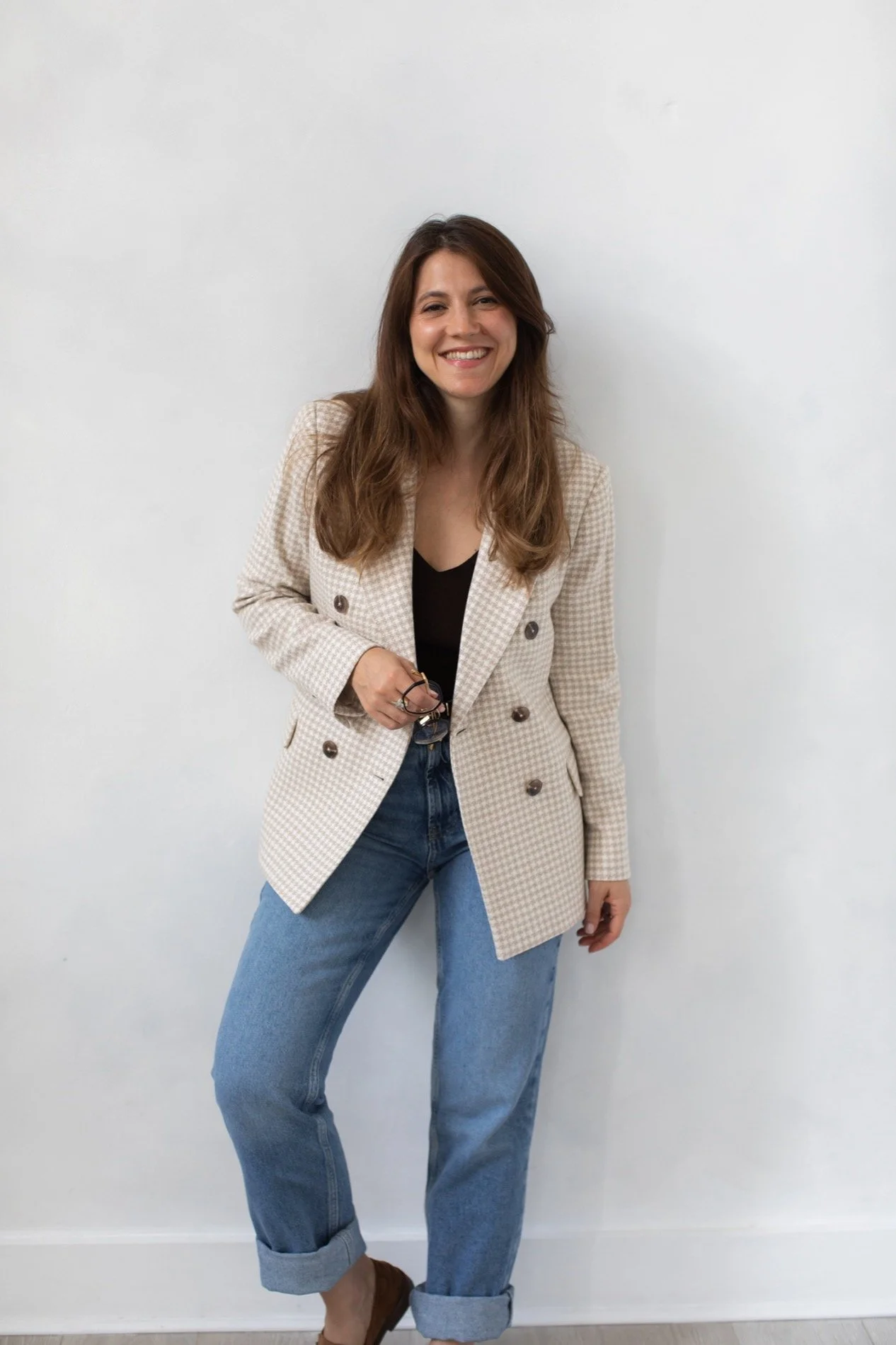 Wedding SEO consultant and coach, Nergis Yuksel, smiling at a camera