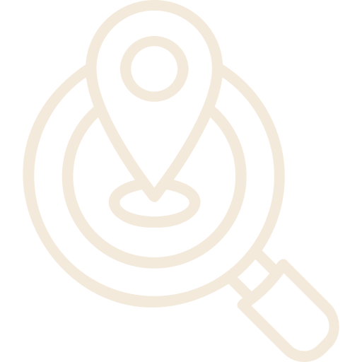 Icon of a location pin inside a magnifying glass, representing search or finding a location.