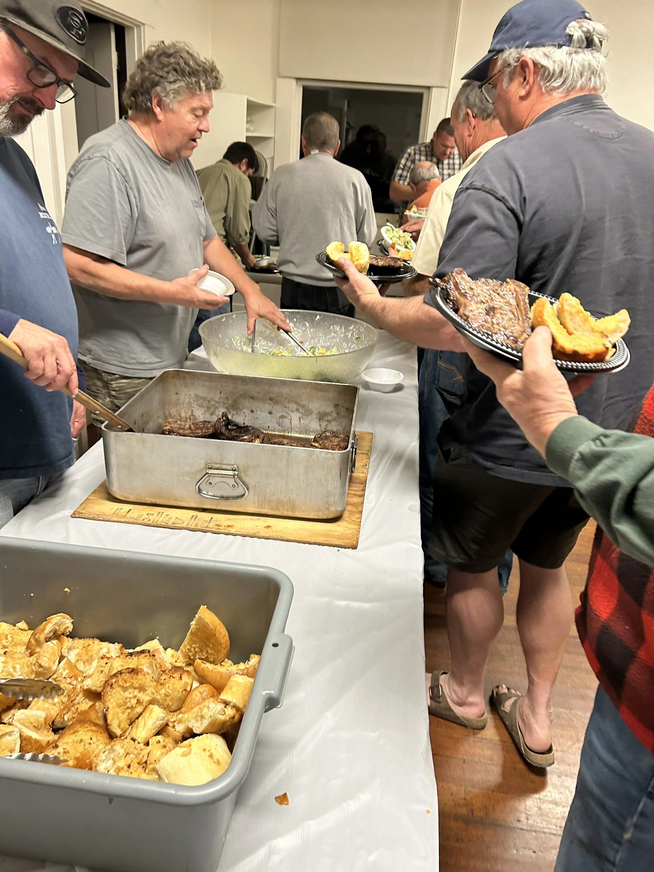 Eric Unruh helping out at Social dinner