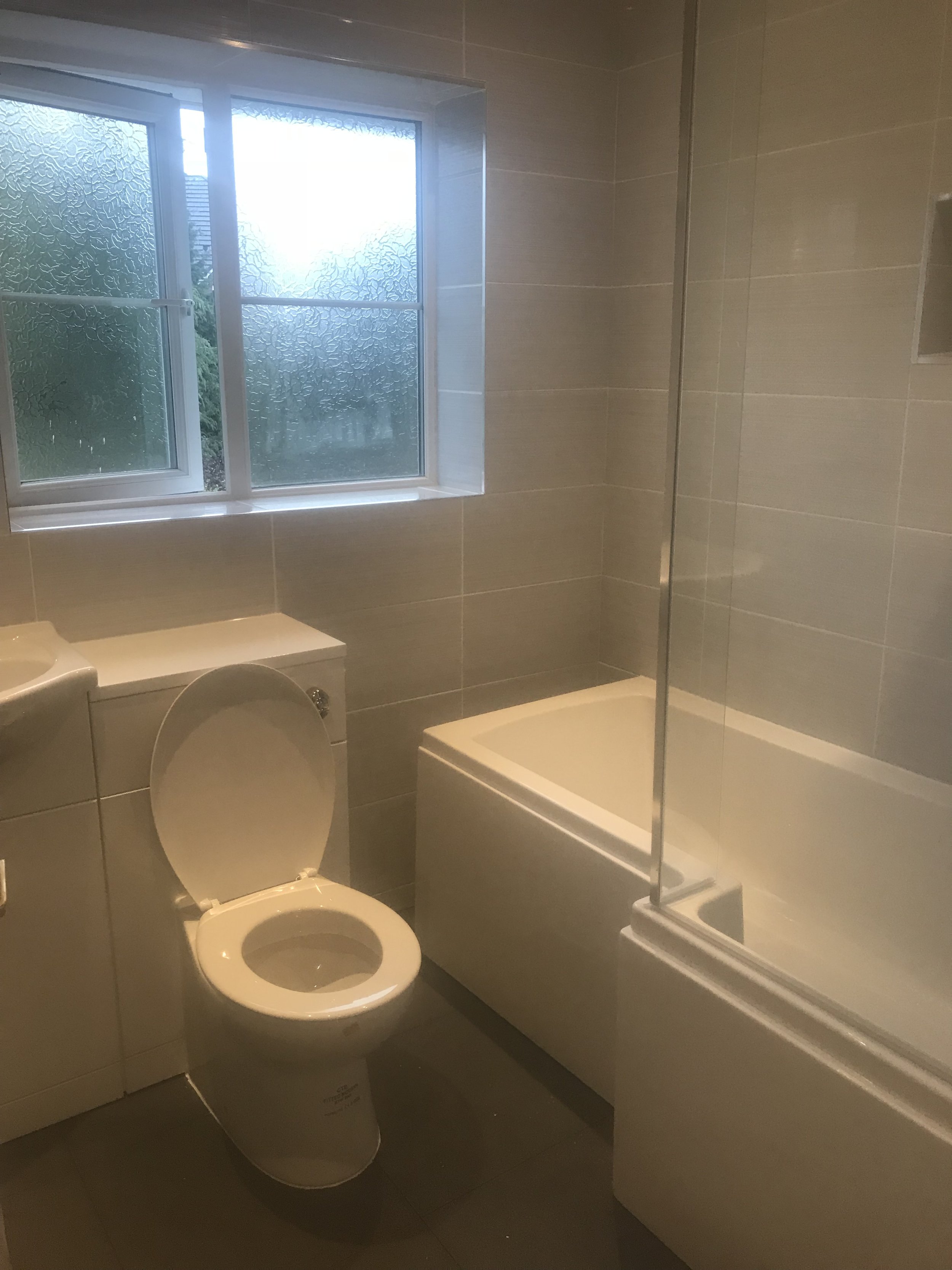 bathroom white and tile.jpeg