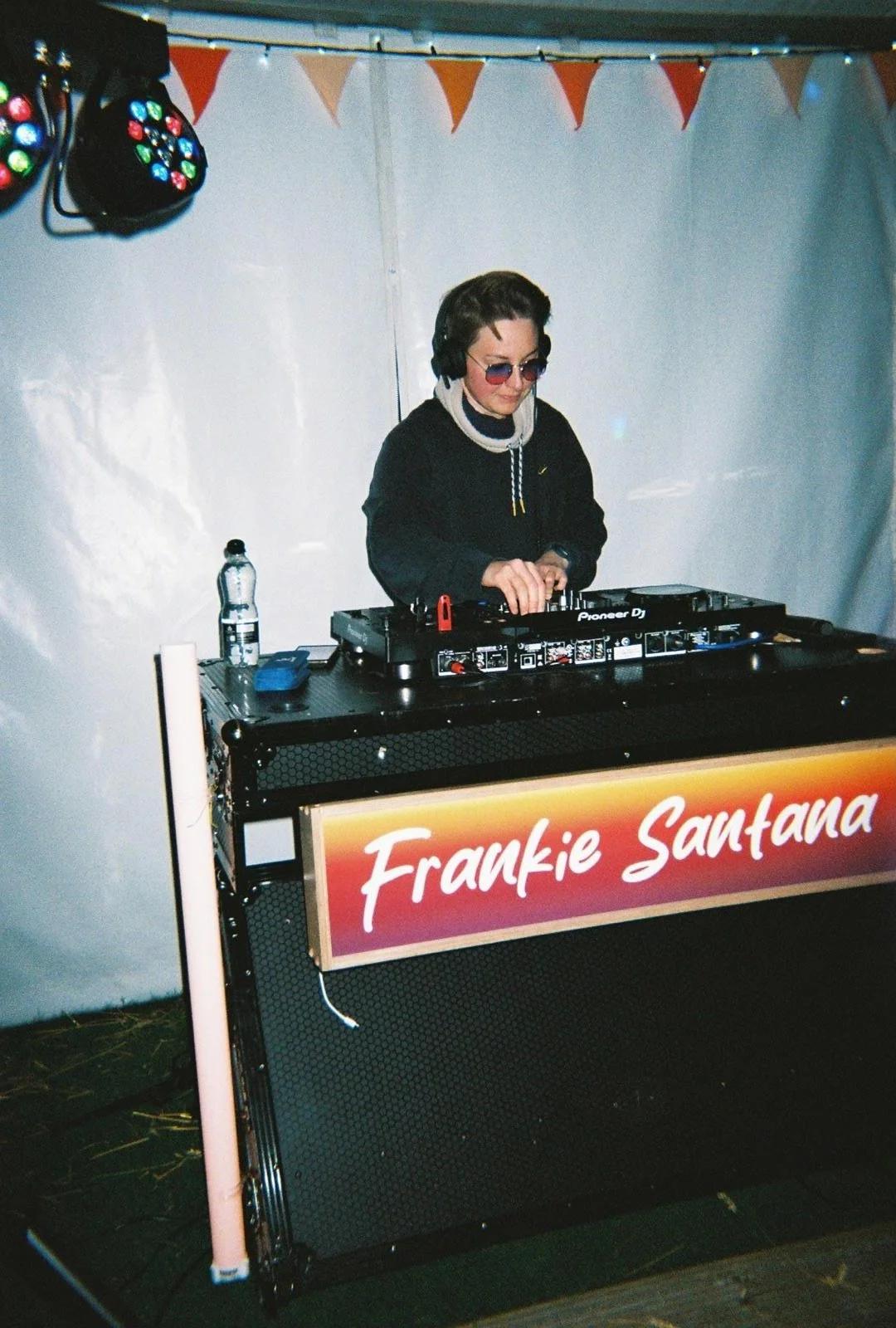 Low resolution picture of DJ Frankie Santana DJing a low budget festival