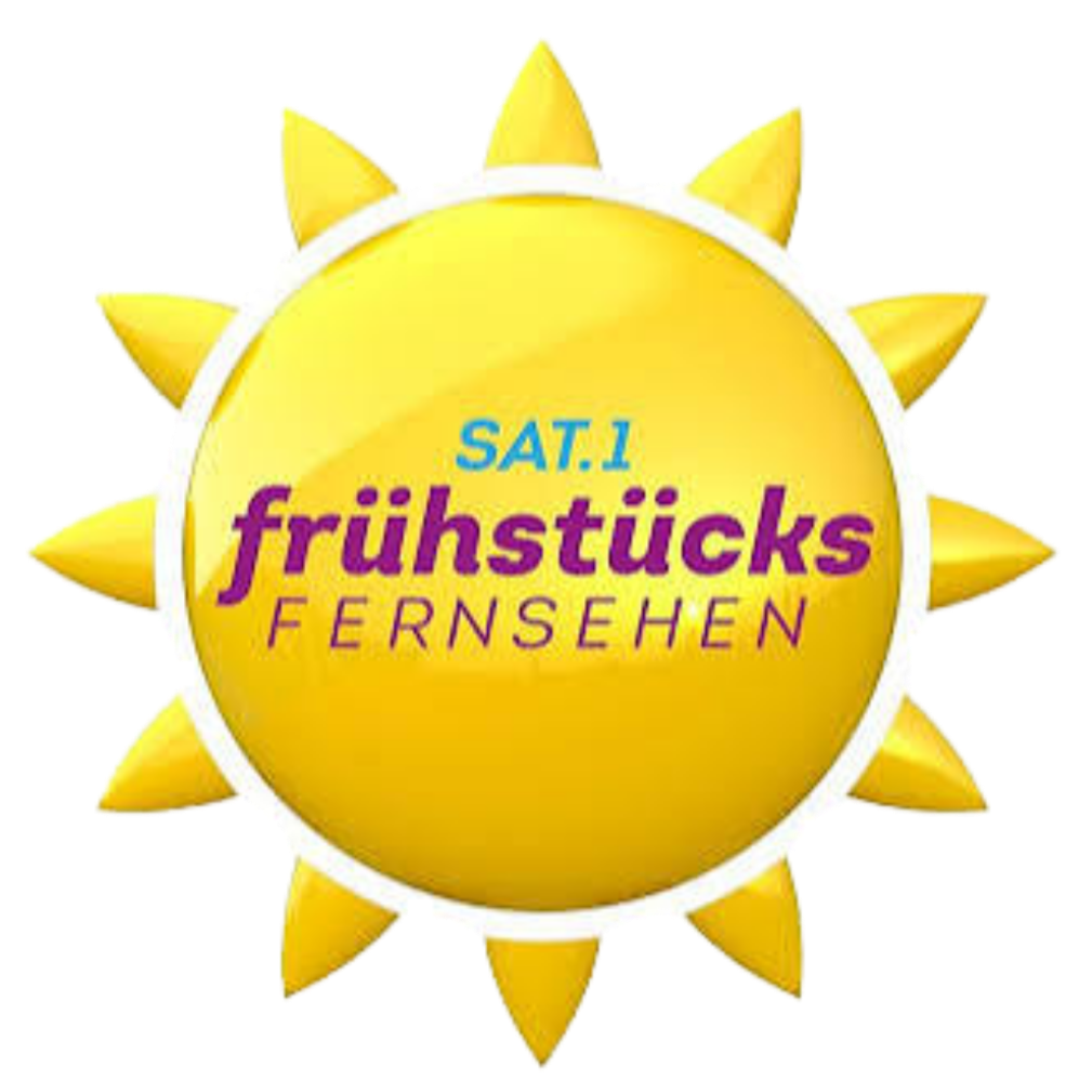 Logo des deutschen Fernsehsenders SAT.1 Frühstücksfernsehen, dargestellt als gelbe Sonne mit strahlenartiger Umrandung. Text in der Mitte: 'SAT.1 frühstücks FERNSEHEN'.
