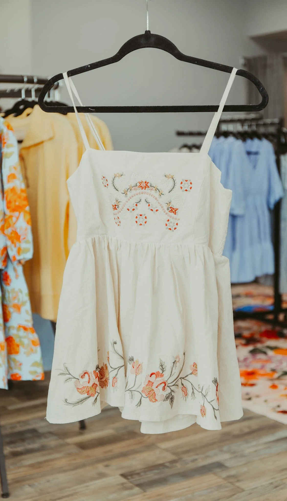 Floral Embroidered Peplum Tank