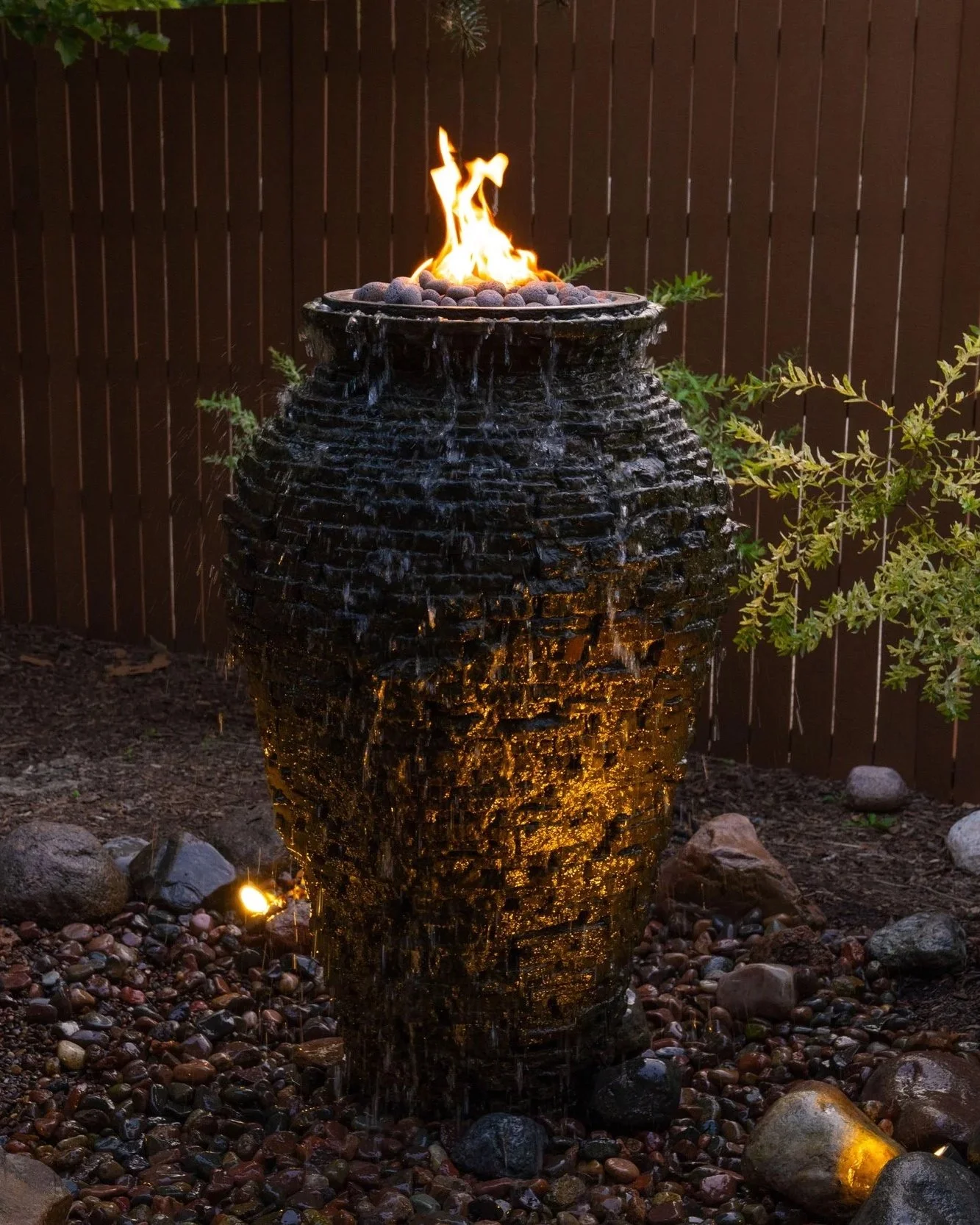 Tall water feature with fire.