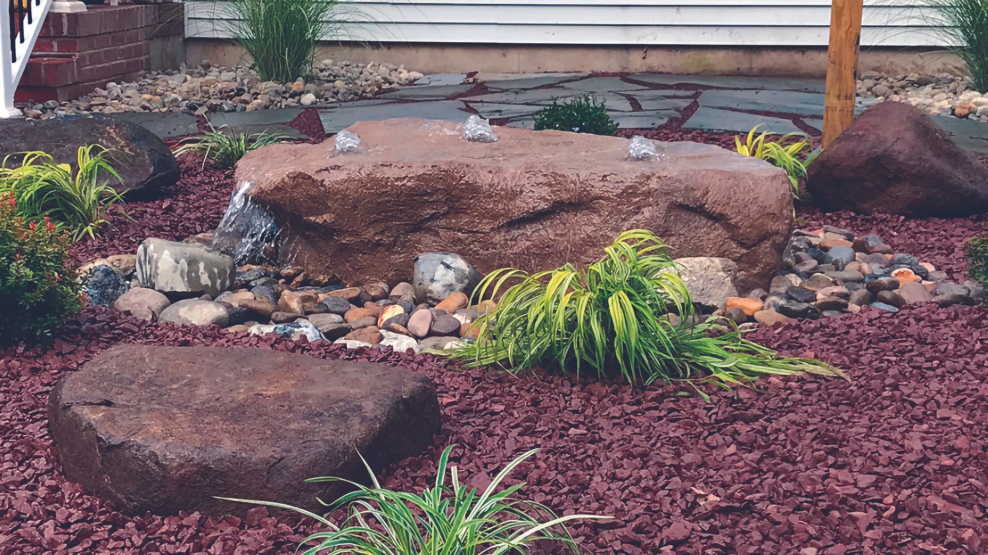 Three fountains in one large rock