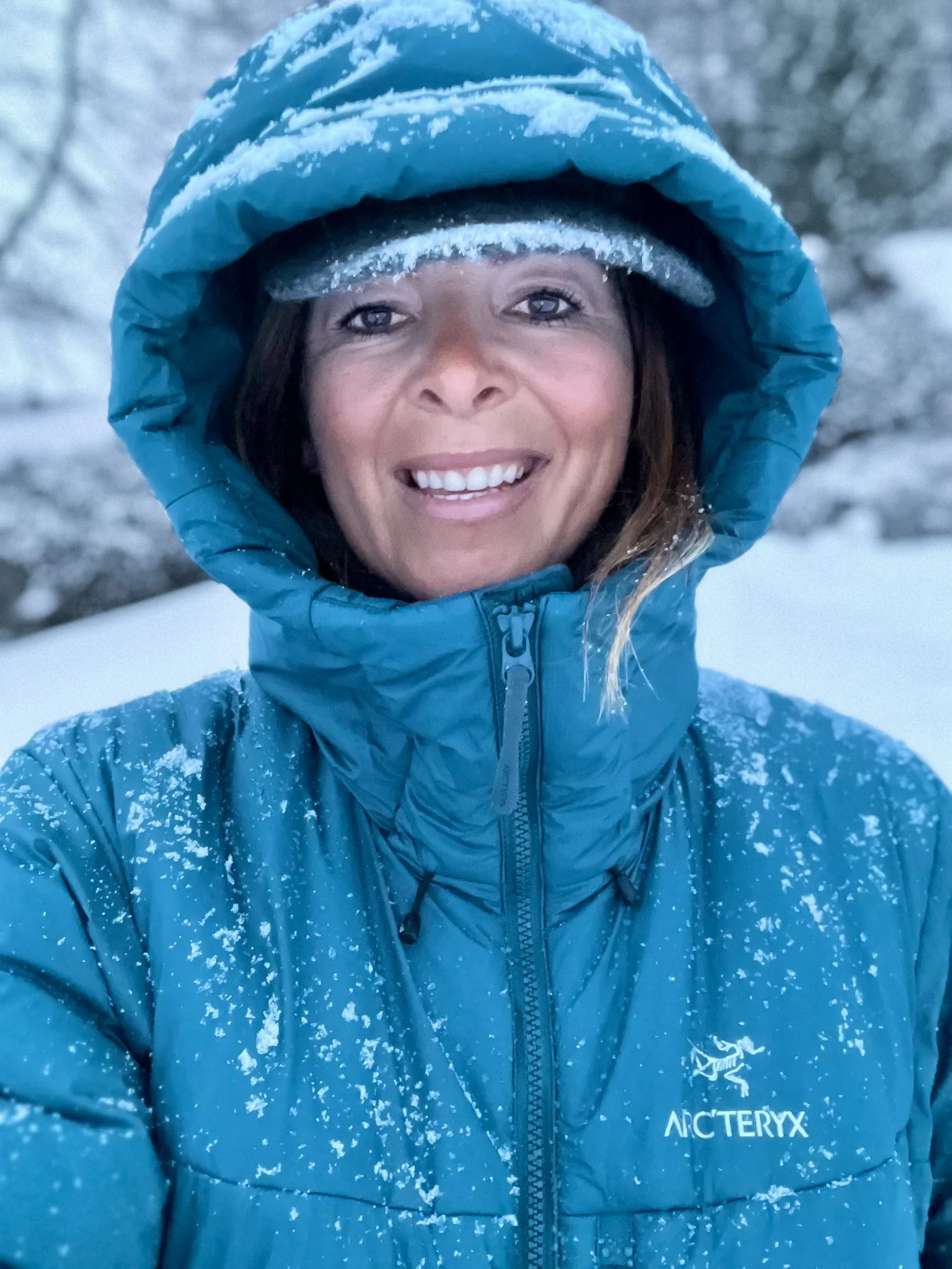 International Mountain Leader, Polar Expedition Guide, Photographer and Drone Pilot Alex. This is a profile photo of Alex in a wintery landscape in St. Moritz, Switzerland.
