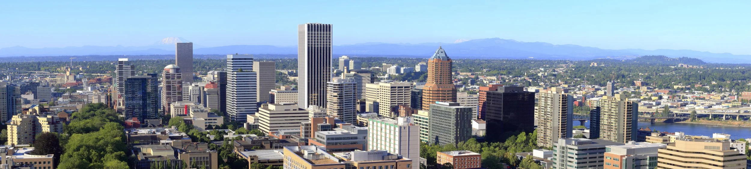 Aerial view of Portland, Oregon commercial real estate district with downtown office towers