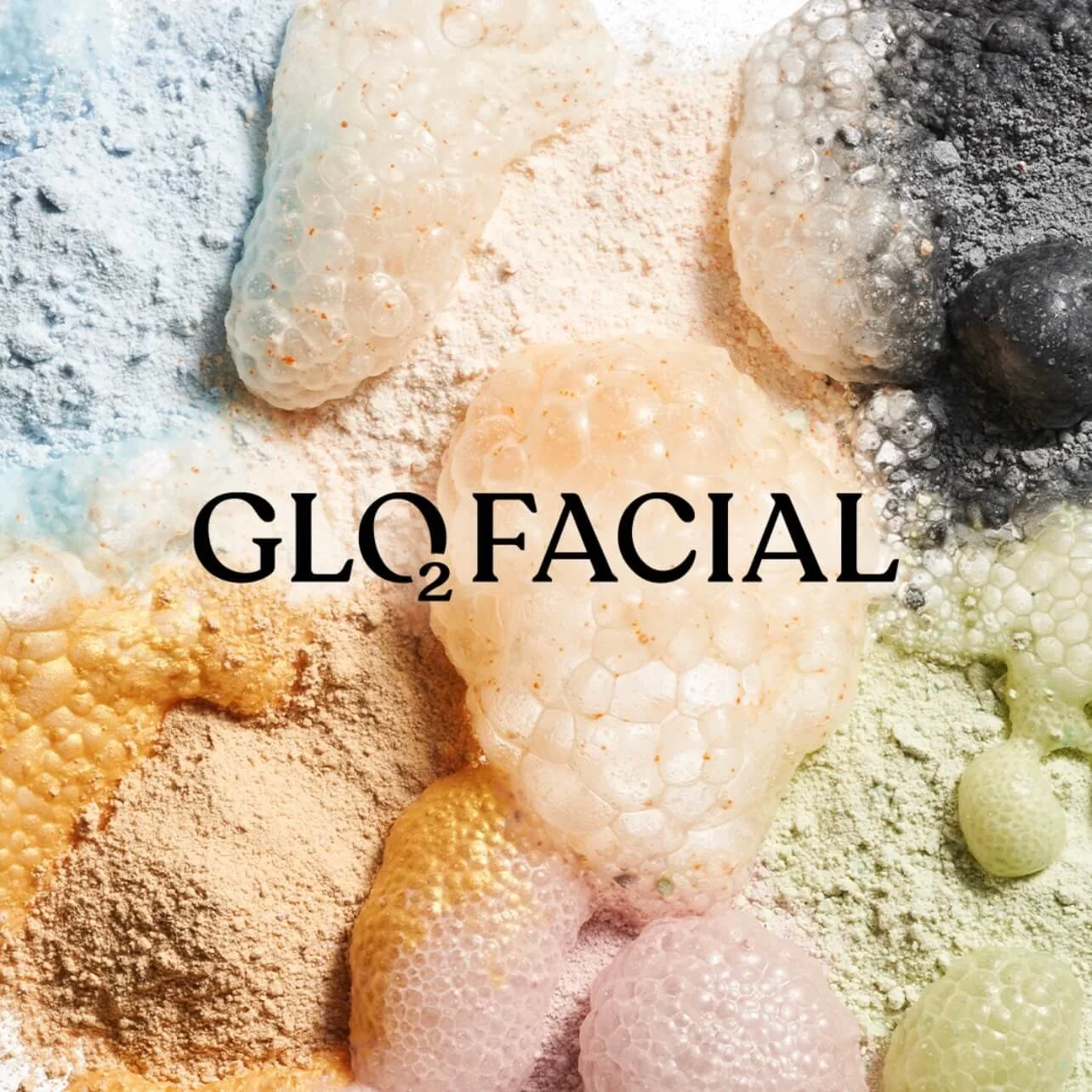 Colorful assortment of skincare or cosmetic powders and foamed substances with the text 'GLΩ FACIAL' overlaid.