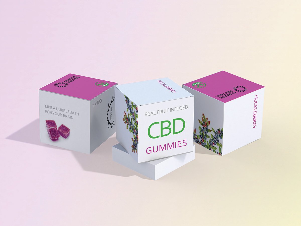 A folded paper cube design that promotes CBD gummies.