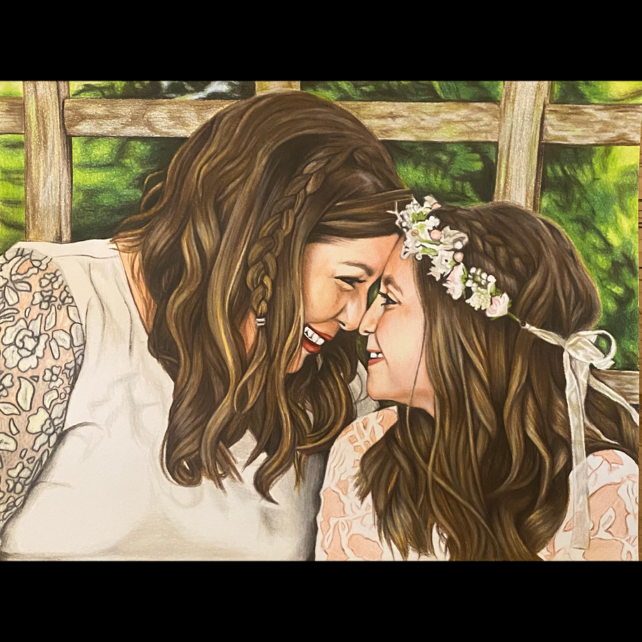 A colored pencil portrait featuring a mother and daughter with long brown hair, smiling and touching foreheads, dressed in lace dresses, with the daughter wearing a floral crown, against a wooden fence and green foliage background.