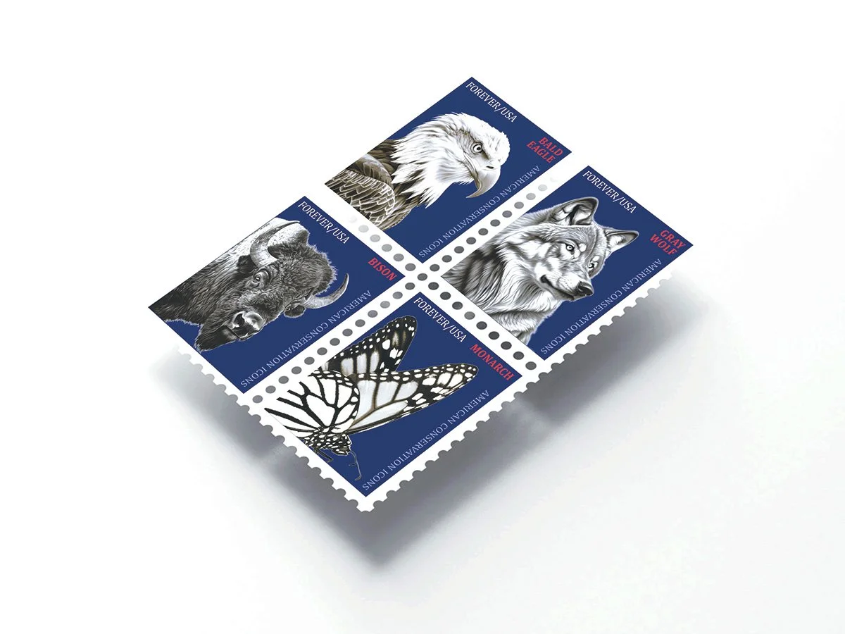 A set of four 'Forever USA' postage stamps featuring American conservation icons including a monarch butterfly, bison, bald eagle, and gray wolf in black and white, with a blue background and red text indicating their species.