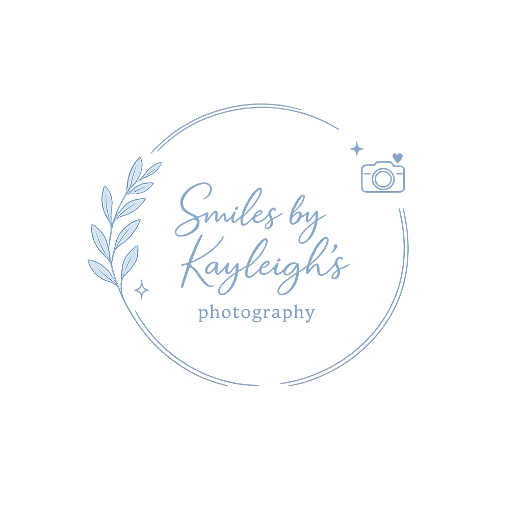 Logo for Smiles by Kayleigh's Photography featuring a circular design with a leafy branch on the left, a small camera icon on the right, and text in the center in a handwritten style.