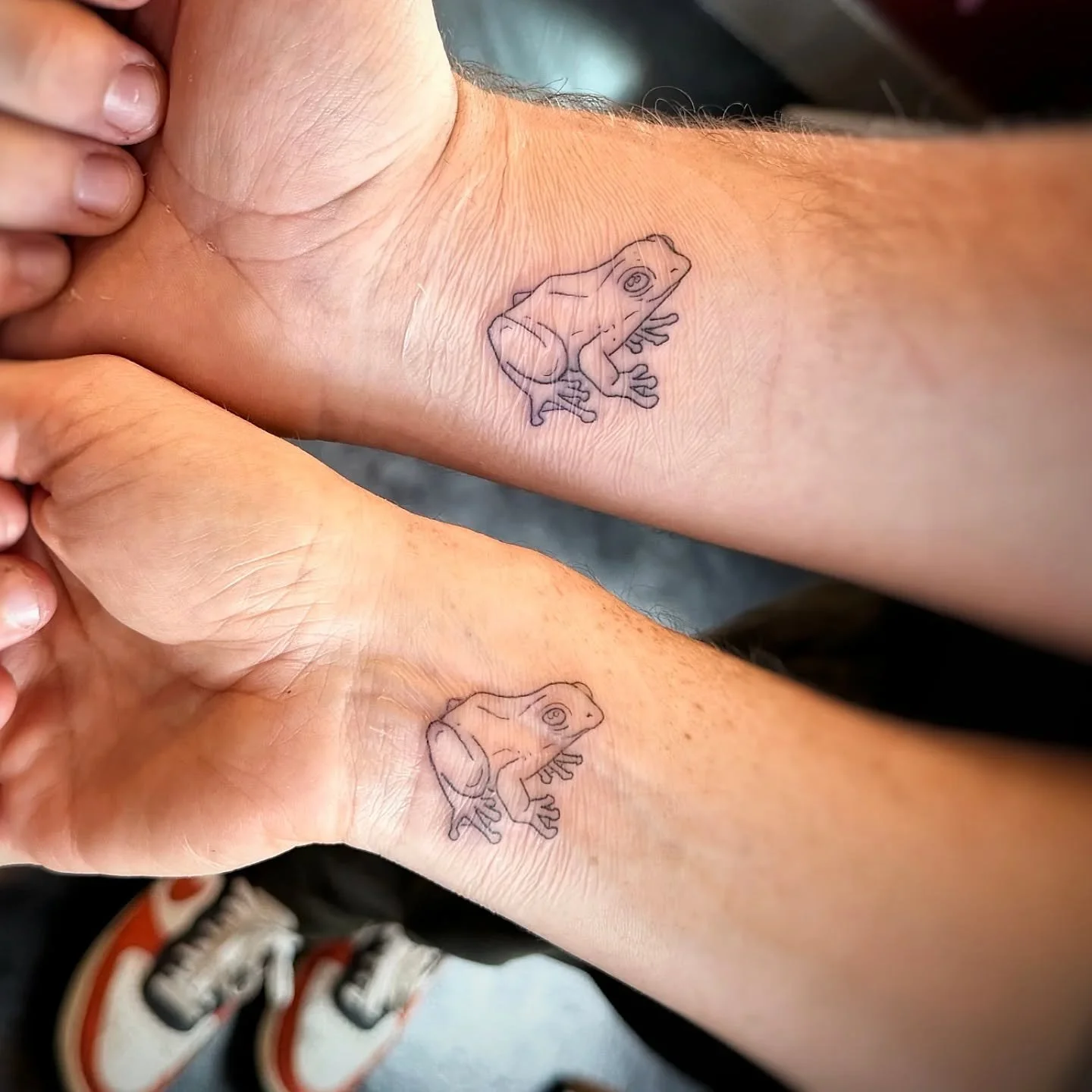 An un-frog-ettable matching tattoo for mom and son 🐸 

#inkhearttattoopdx #inkhearttattoo #inkheartpdx  #wristtattoo #blackandgreytattoo #blackworktattoo  #matchingtattoos #frogtattoo #likemotherlikeson #family #portlandartist #portlandtattooartist 