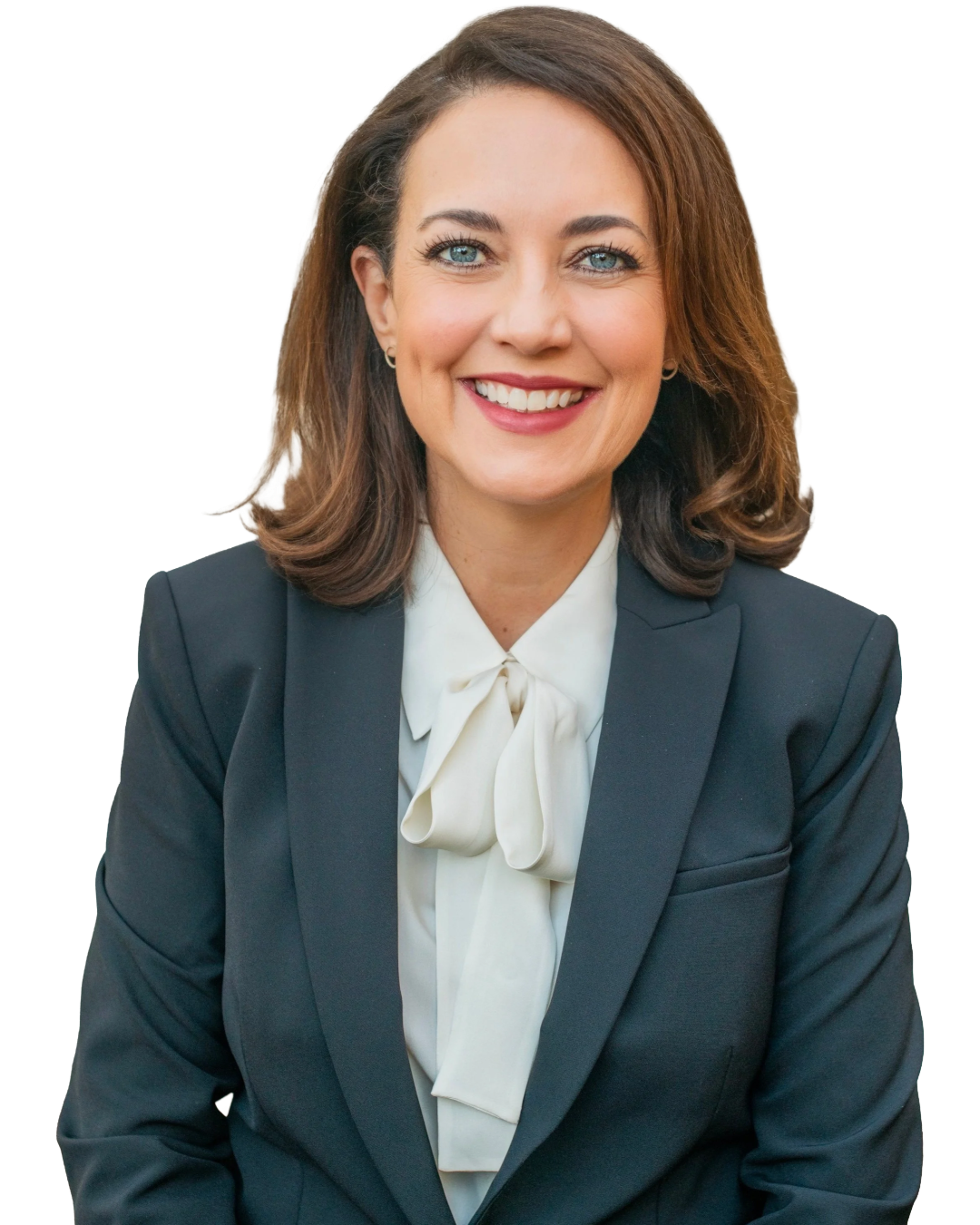 A smiling Caucasian woman with shoulder-length brown hair wearing a dark blazer and a white blouse.