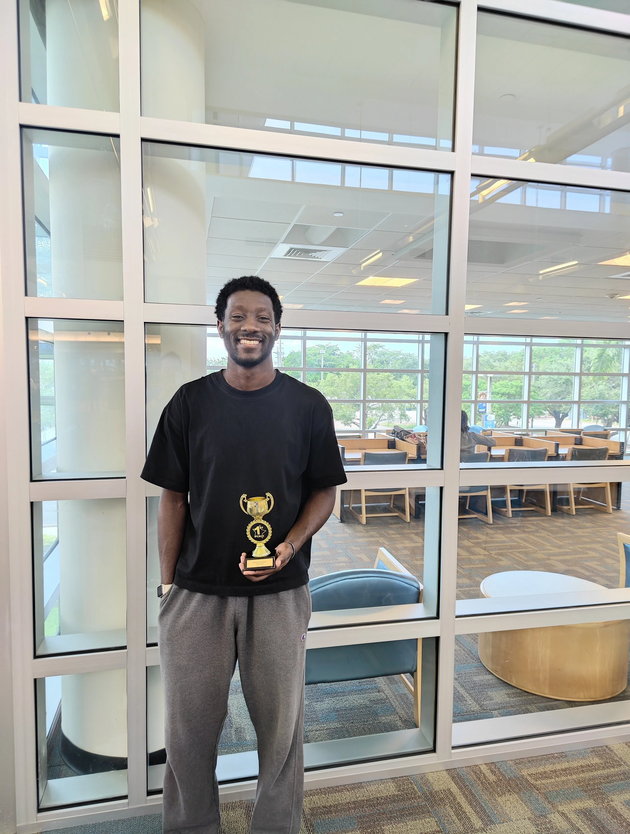 1st Place Quad C Champion Marvin Belizaire