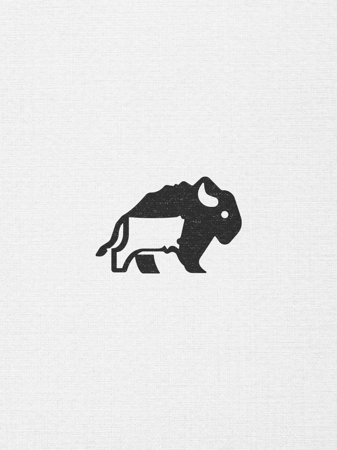 Black and white logo of a buffalo.