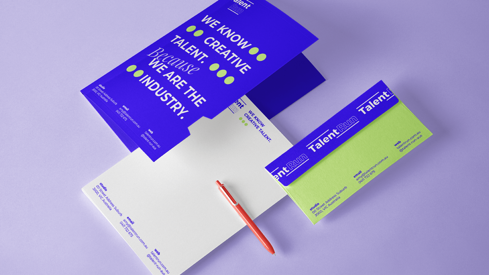 Brochures and business cards for Talent Run, an organization promoting creative talent and industry, with a red pen on a light purple background.