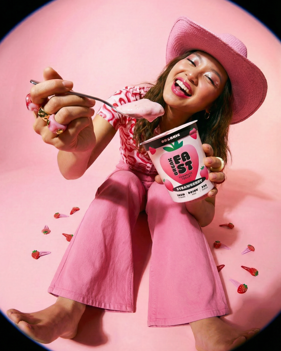 A colorful webpage promoting financial management tools, featuring images of smiling women and sections titled 'Track spend,' 'Auto save,' and 'Insights,' with a prominent message encouraging control over your financial future and a testimonial quote about understanding money.