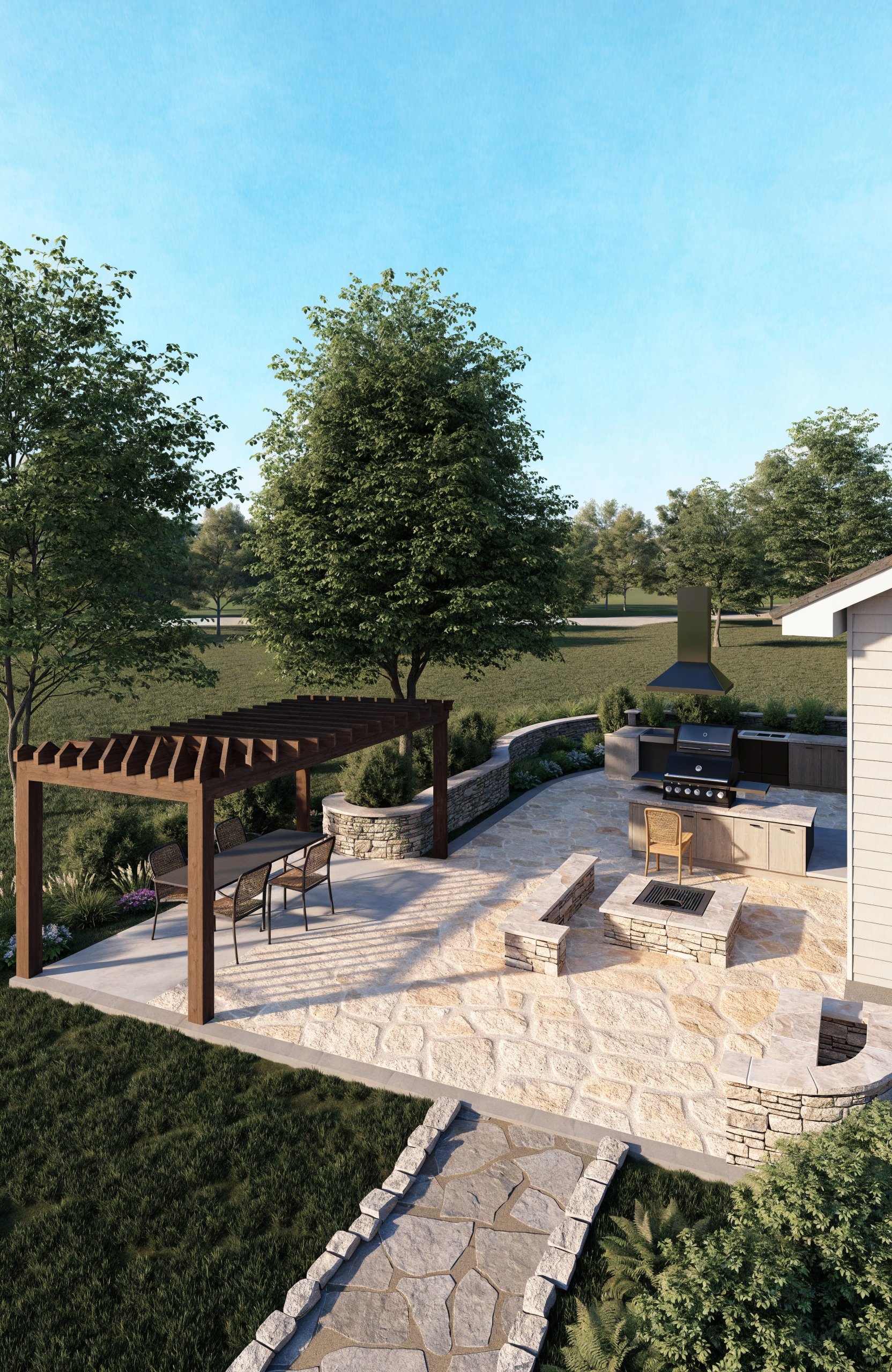 Backyard with stone patio, outdoor kitchen with grill, fire pit, shaded dining area with table and chairs, pergola, lush green lawn, trees, and a clear blue sky.