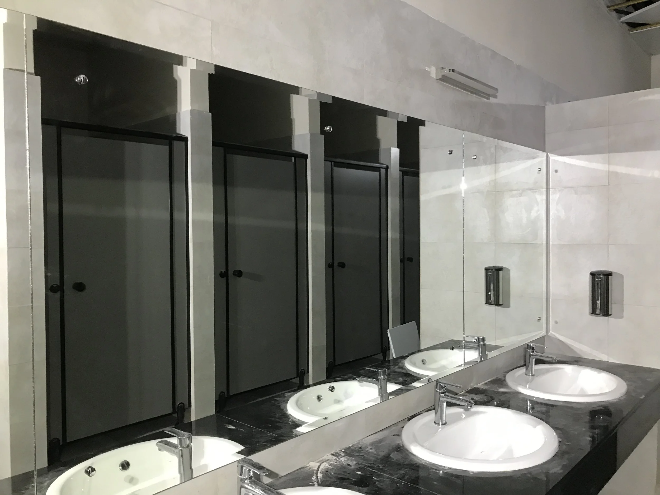 Bathroom Mirror installation with stainless steel capscrews