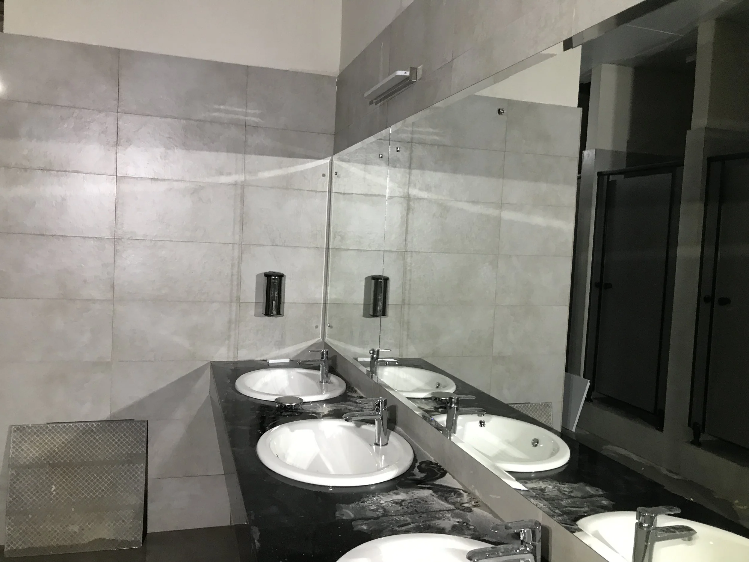 Bathroom Mirror installation with stainless steel capscrews