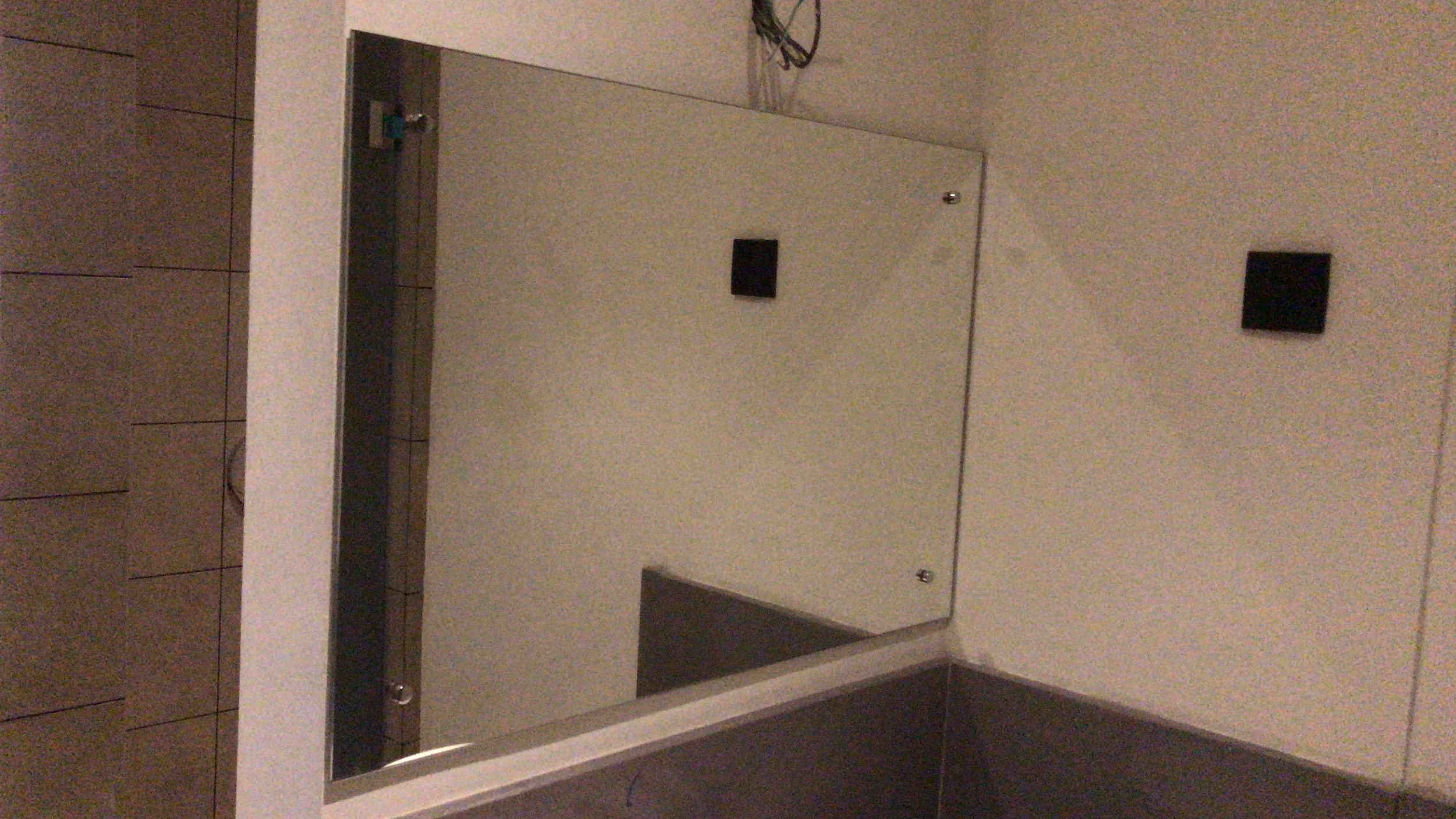 Bathroom Mirror installation with stainless steel capscrews